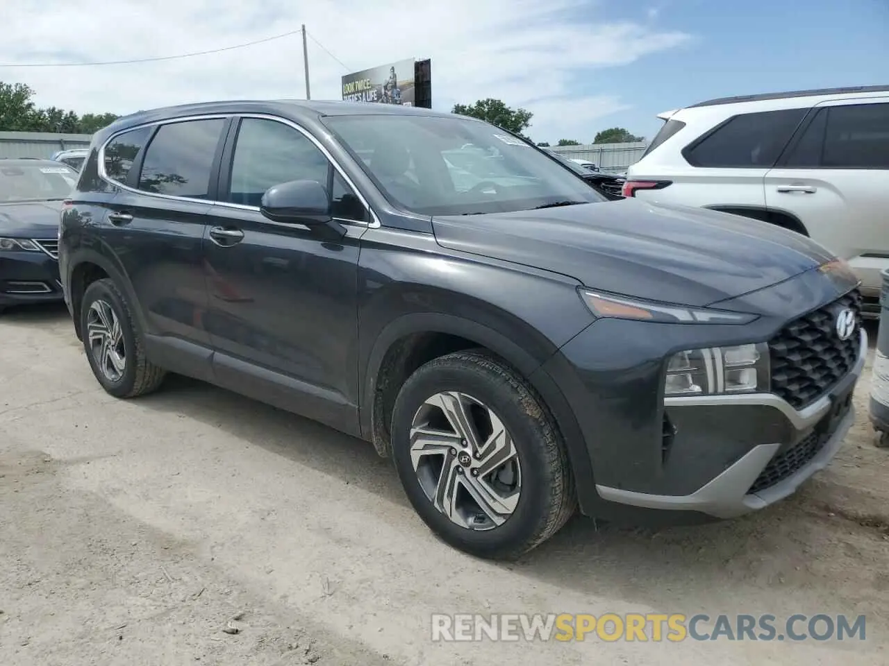 4 Photograph of a damaged car 5NMS14AJ7PH576232 HYUNDAI SANTA FE 2023