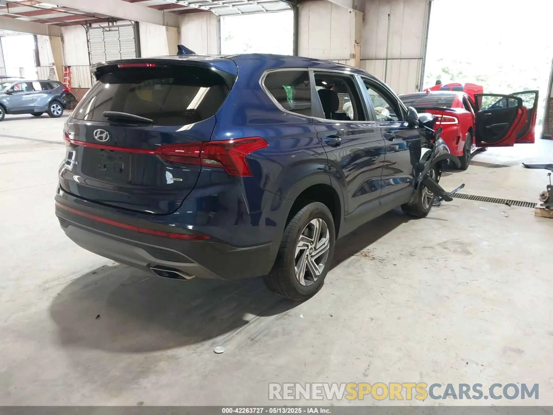 4 Photograph of a damaged car 5NMS1DAJ3PH592136 HYUNDAI SANTA FE 2023