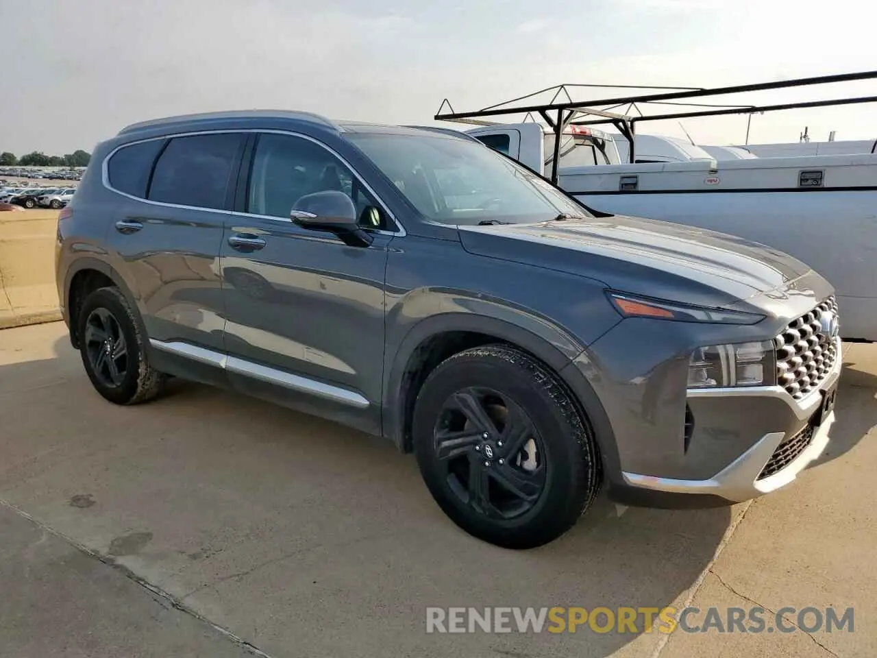 4 Photograph of a damaged car 5NMS34AJ4PH502065 HYUNDAI SANTA FE 2023
