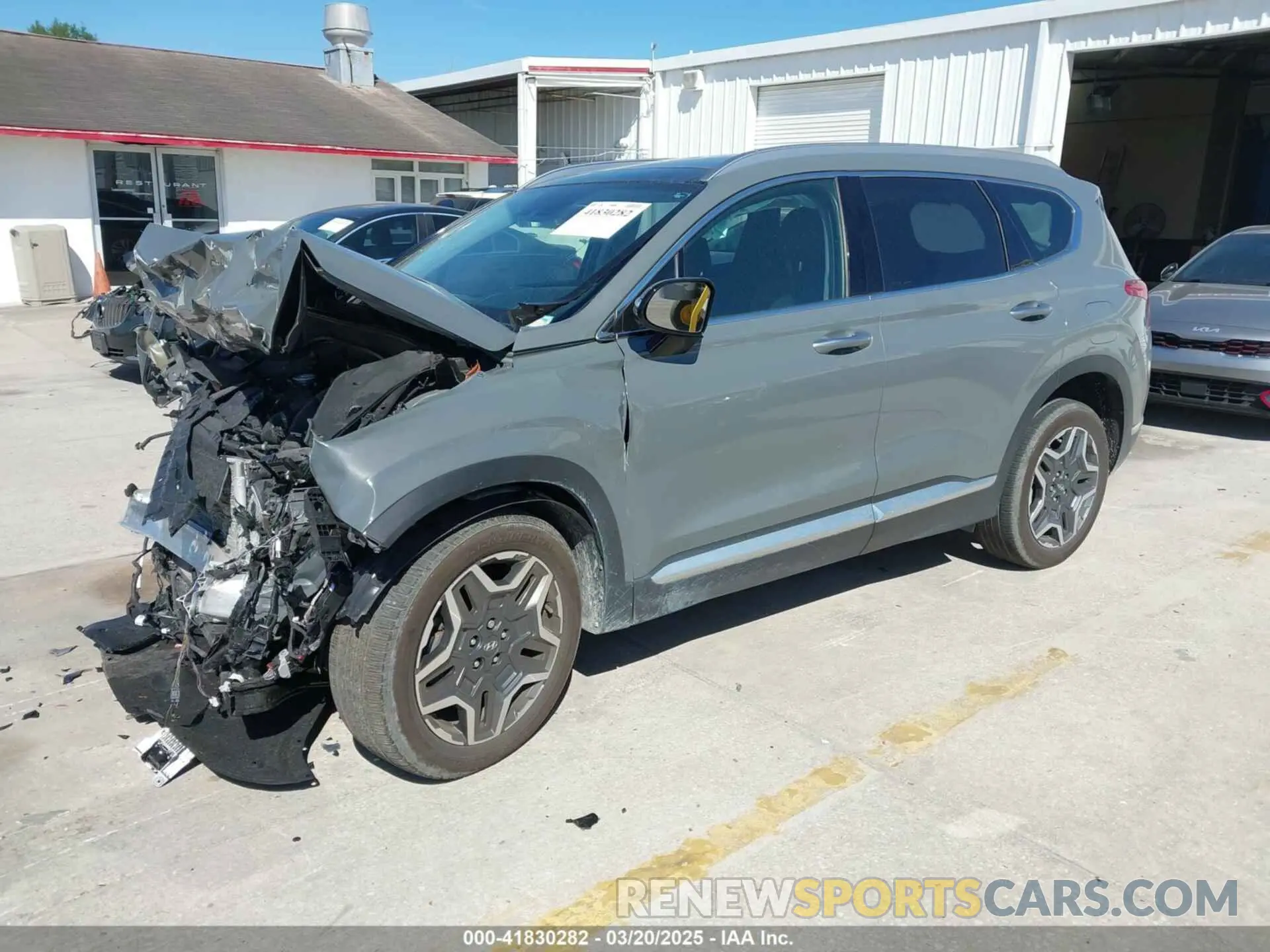 2 Photograph of a damaged car 5NMS44AL0PH619236 HYUNDAI SANTA FE 2023