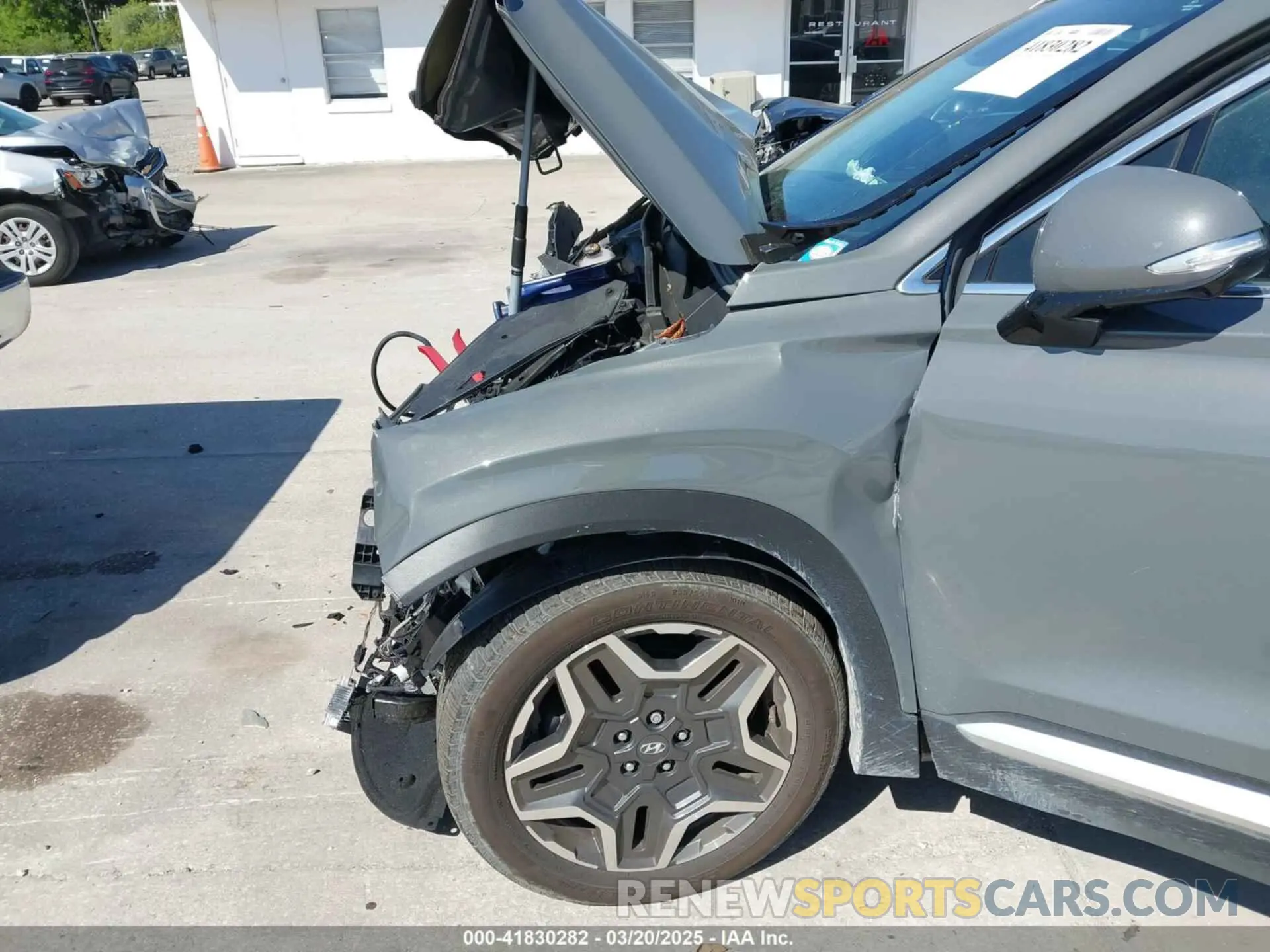 6 Photograph of a damaged car 5NMS44AL0PH619236 HYUNDAI SANTA FE 2023