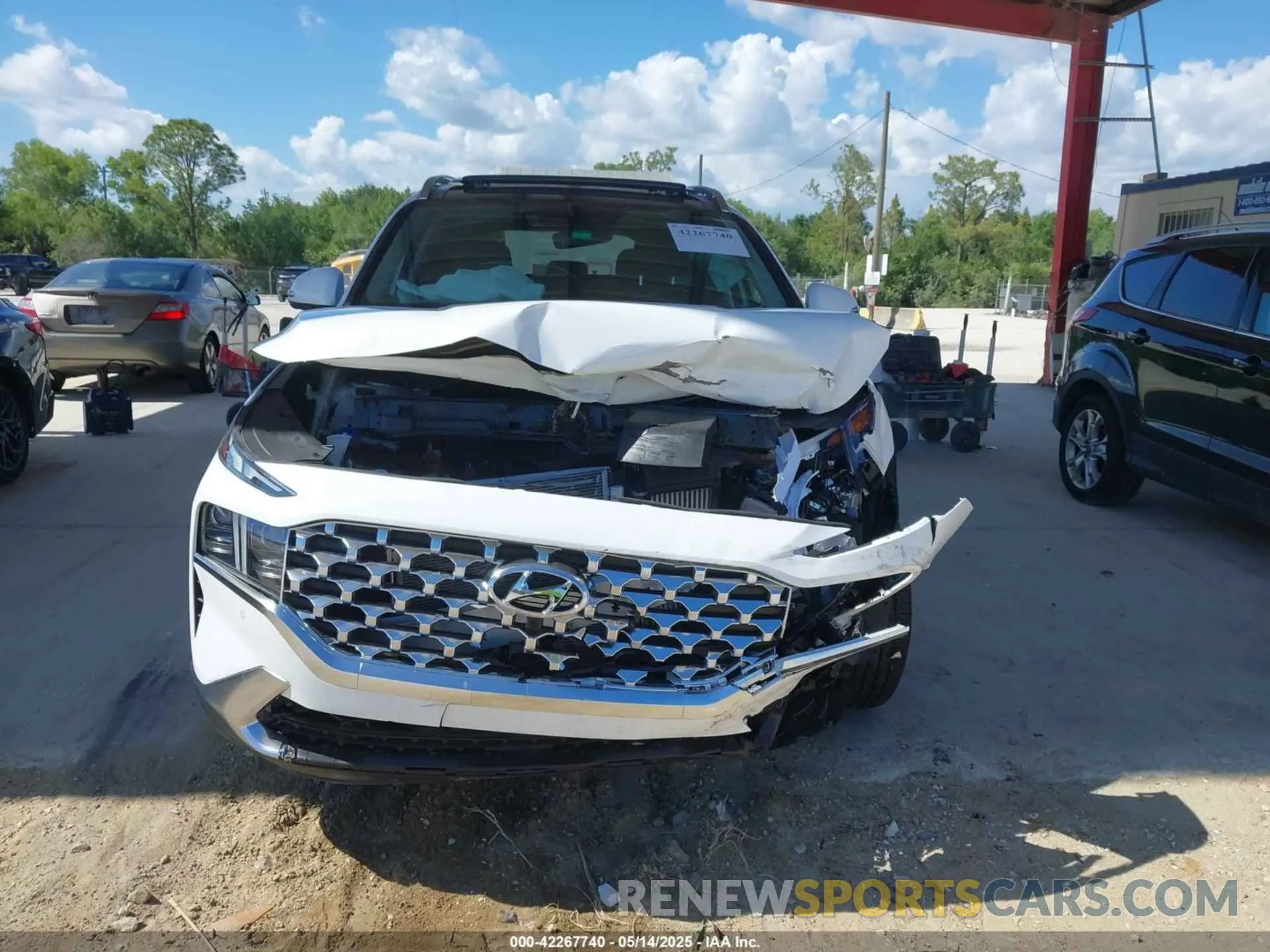 12 Photograph of a damaged car 5NMS4DAL8PH655580 HYUNDAI SANTA FE 2023