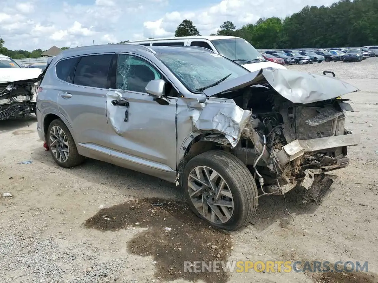 4 Photograph of a damaged car 5NMS54AL1PH647057 HYUNDAI SANTA FE 2023