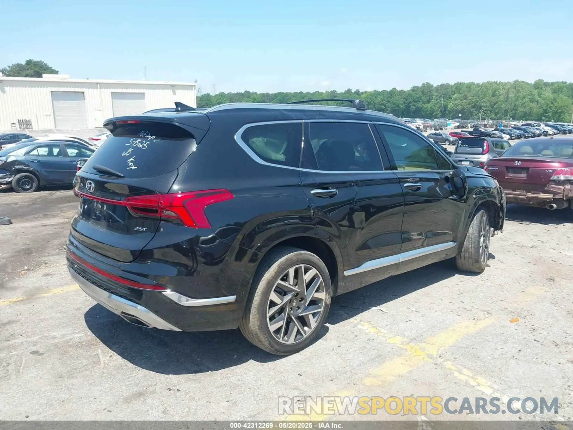 4 Photograph of a damaged car 5NMS54AL7PH486794 HYUNDAI SANTA FE 2023