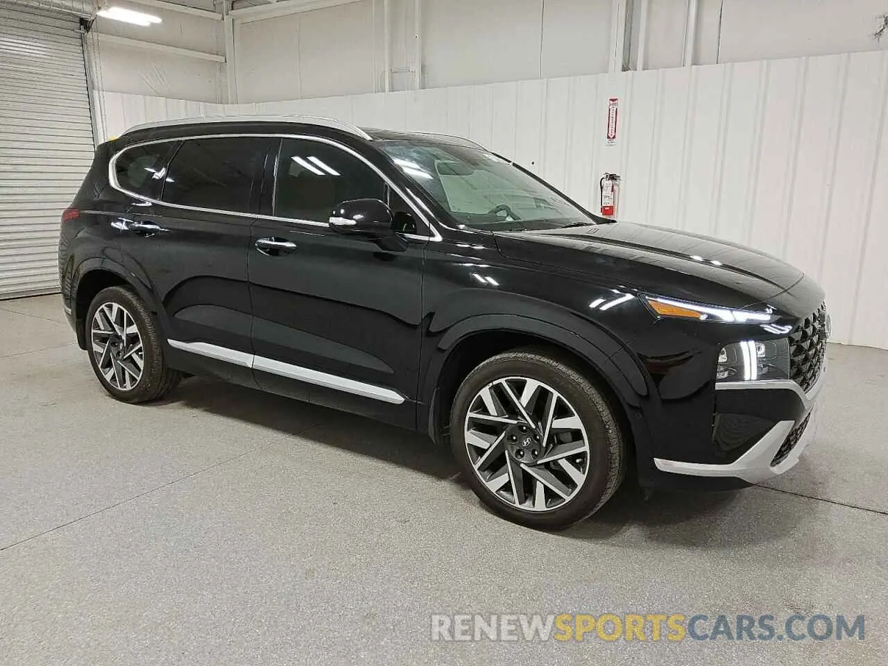 4 Photograph of a damaged car 5NMS54AL8PH500315 HYUNDAI SANTA FE 2023
