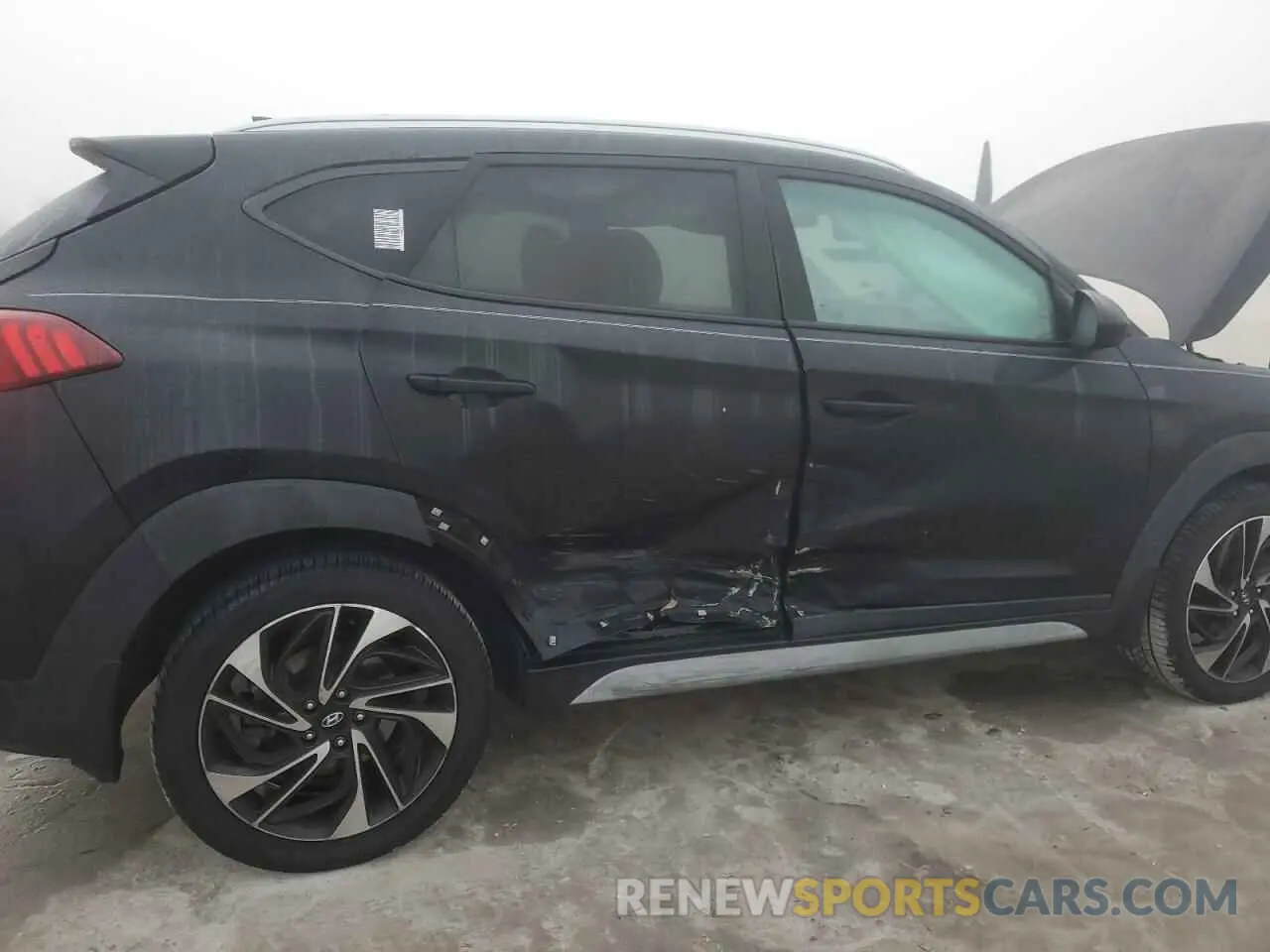 11 Photograph of a damaged car KM8J33AL2KU892345 HYUNDAI TUCSON 2019