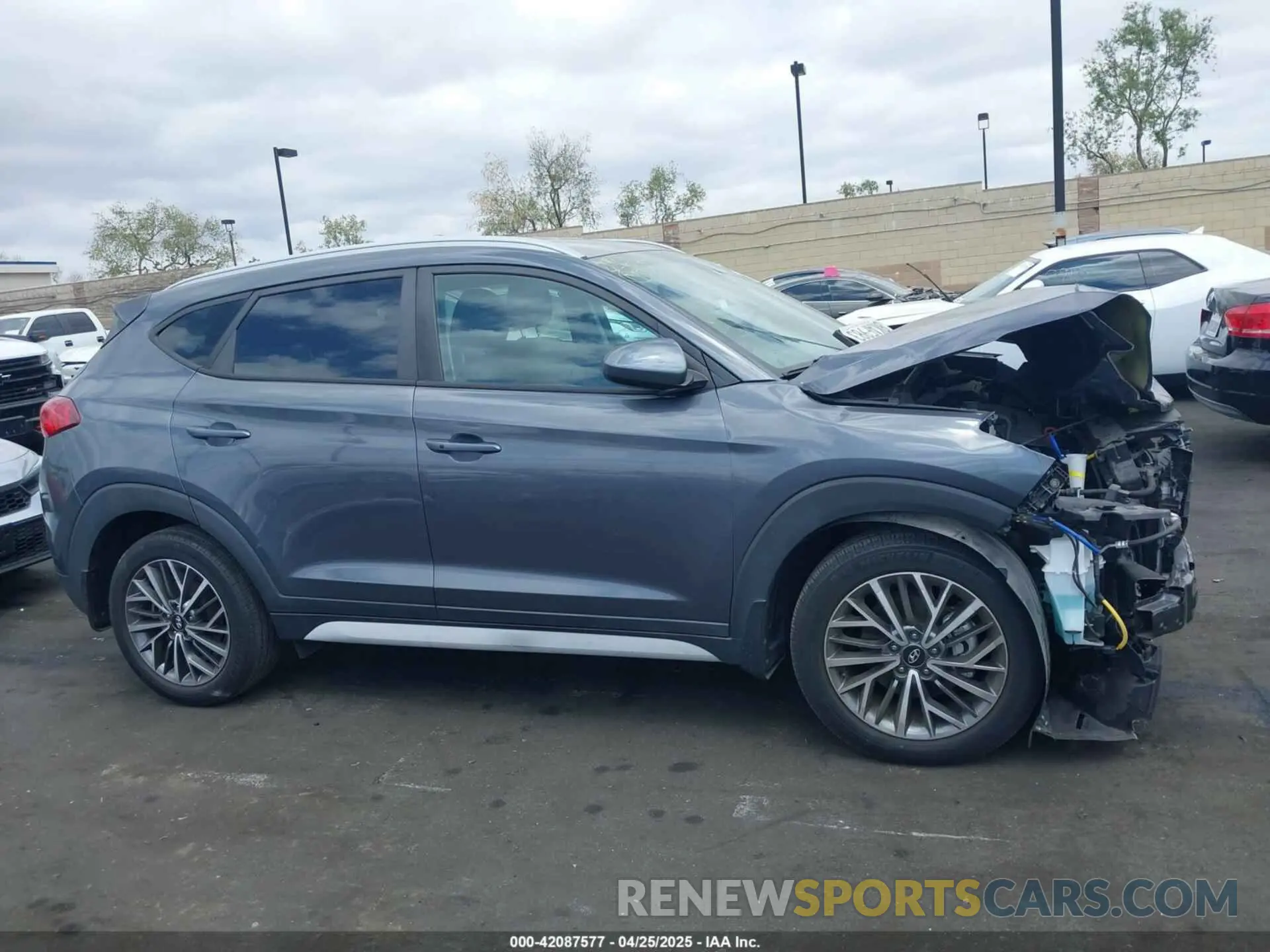 14 Photograph of a damaged car KM8J33AL2KU954388 HYUNDAI TUCSON 2019