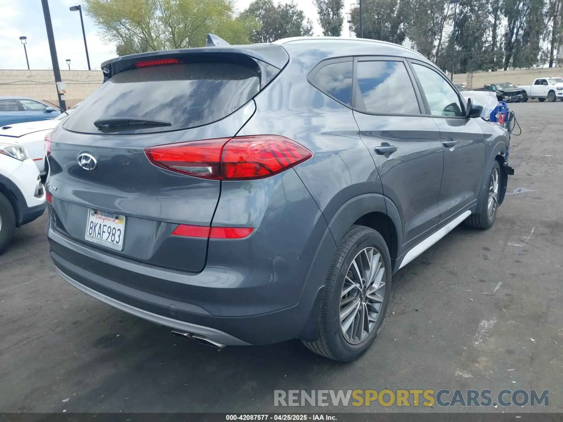 4 Photograph of a damaged car KM8J33AL2KU954388 HYUNDAI TUCSON 2019