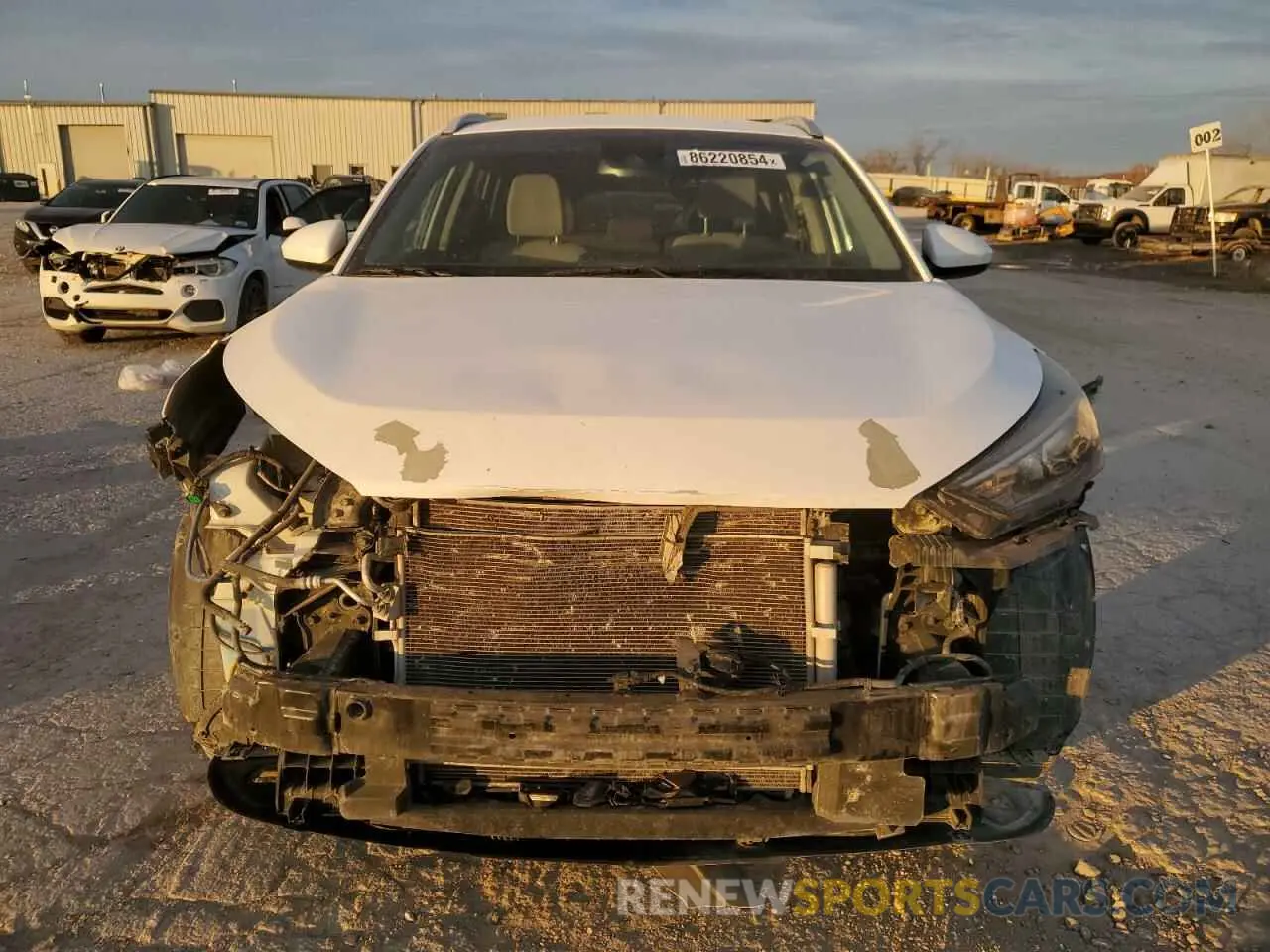 5 Photograph of a damaged car KM8J33AL3KU876123 HYUNDAI TUCSON 2019