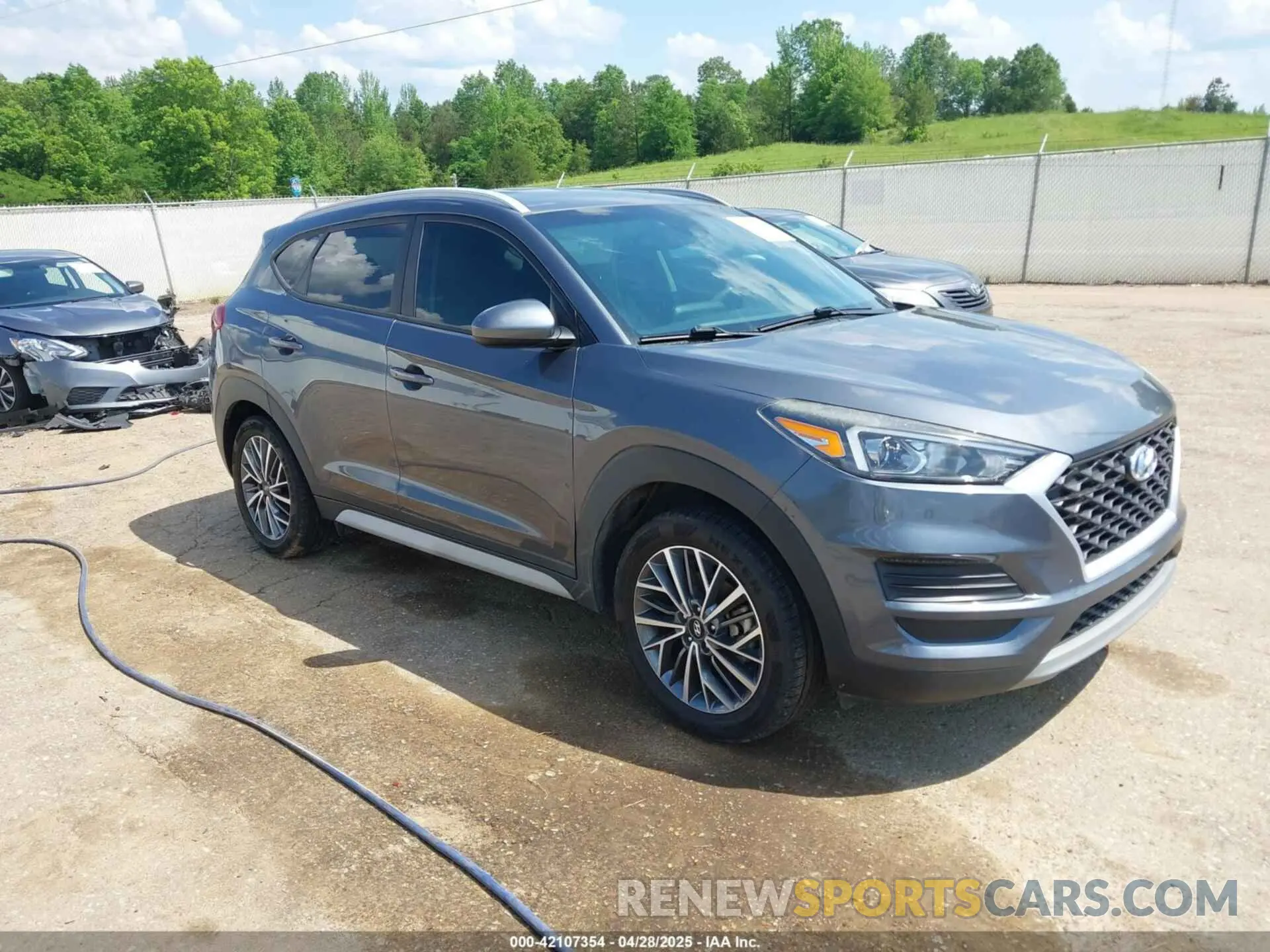 1 Photograph of a damaged car KM8J33AL9KU014718 HYUNDAI TUCSON 2019