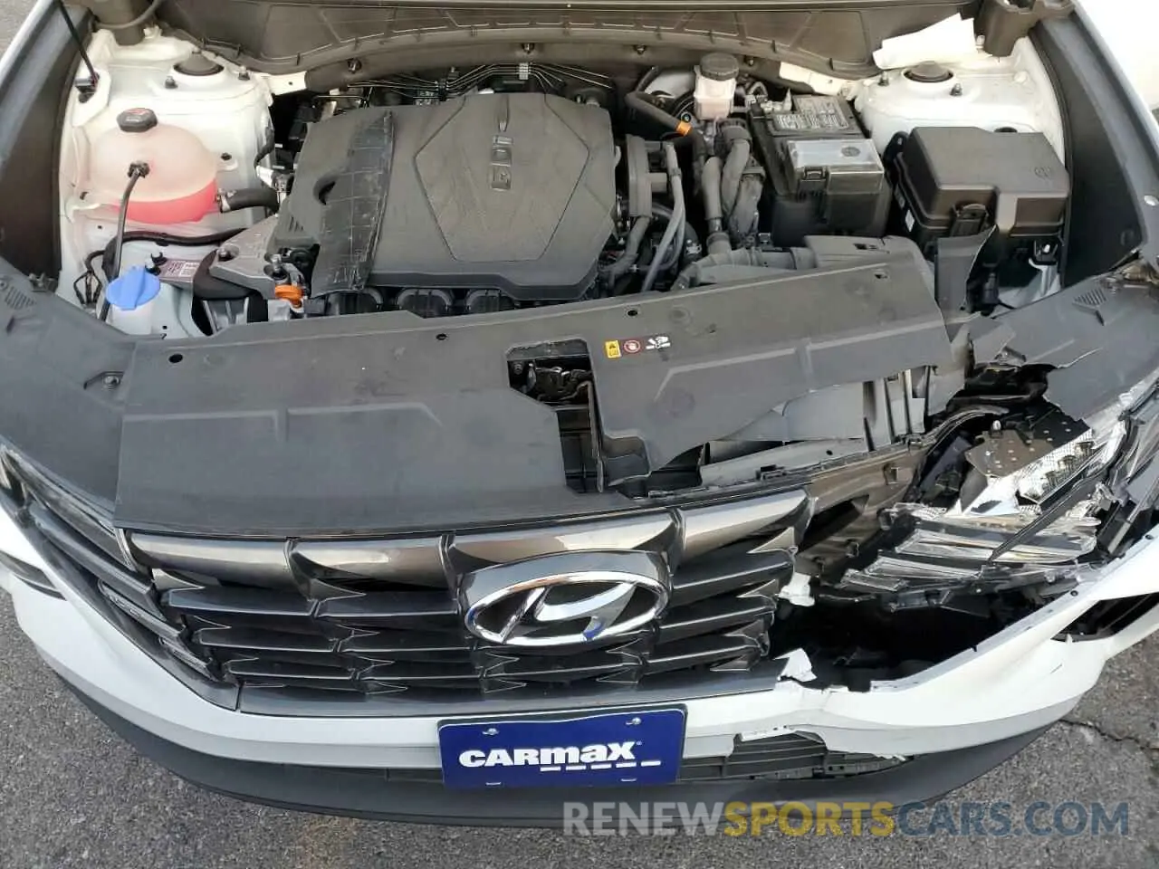 12 Photograph of a damaged car 5NMJA3AE8NH010067 HYUNDAI TUCSON 2022