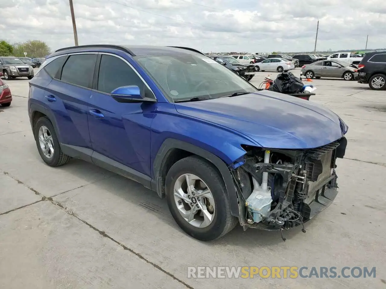 4 Photograph of a damaged car 5NMJB3AE0NH042590 HYUNDAI TUCSON 2022