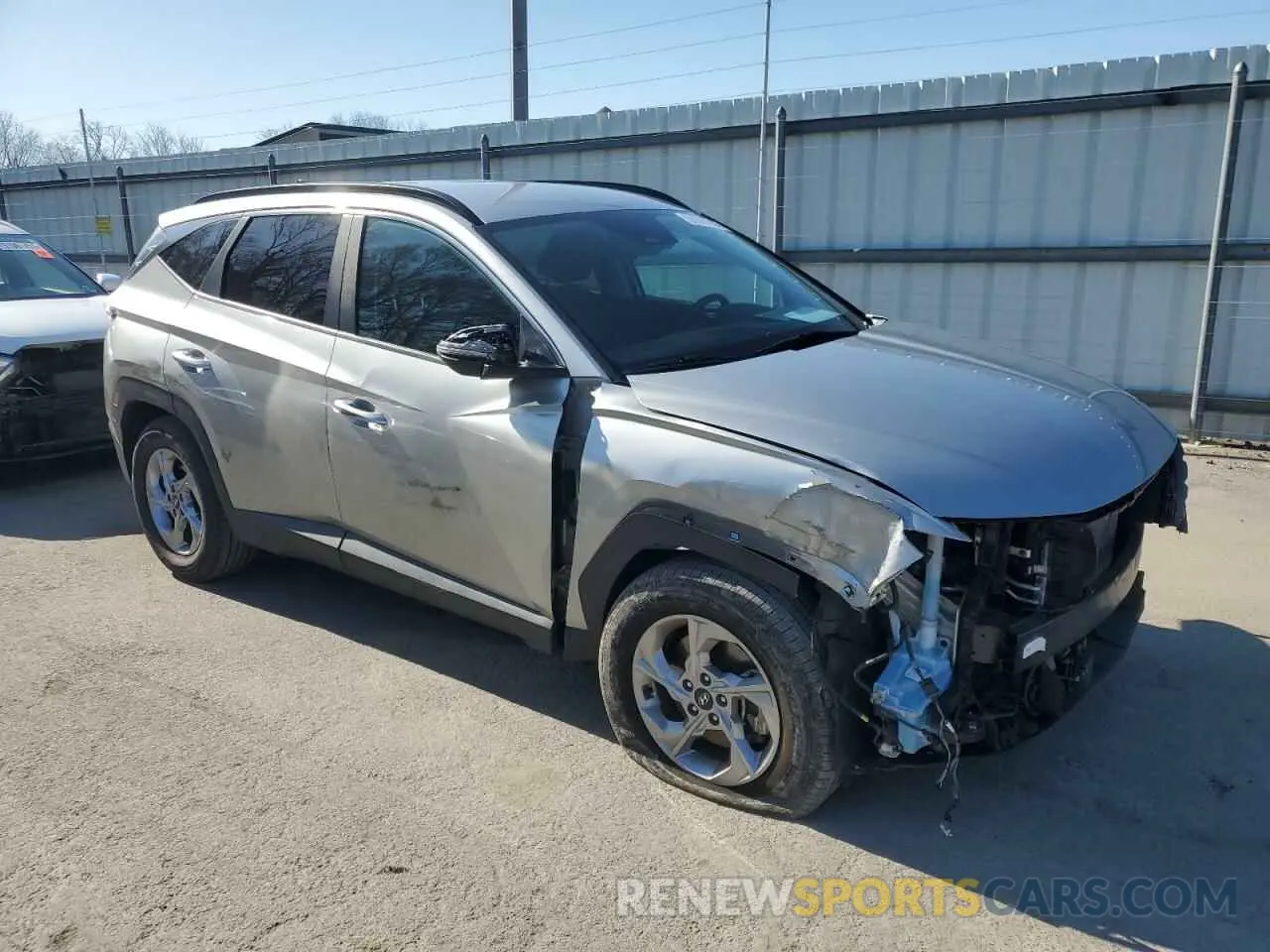 4 Photograph of a damaged car 5NMJBCAE4NH077181 HYUNDAI TUCSON 2022
