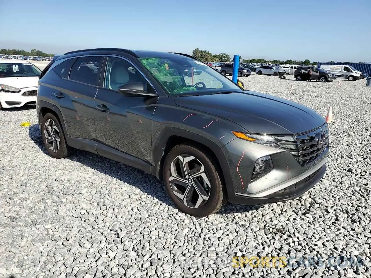 4 Photograph of a damaged car 5NMJC3AE7NH097454 HYUNDAI TUCSON 2022