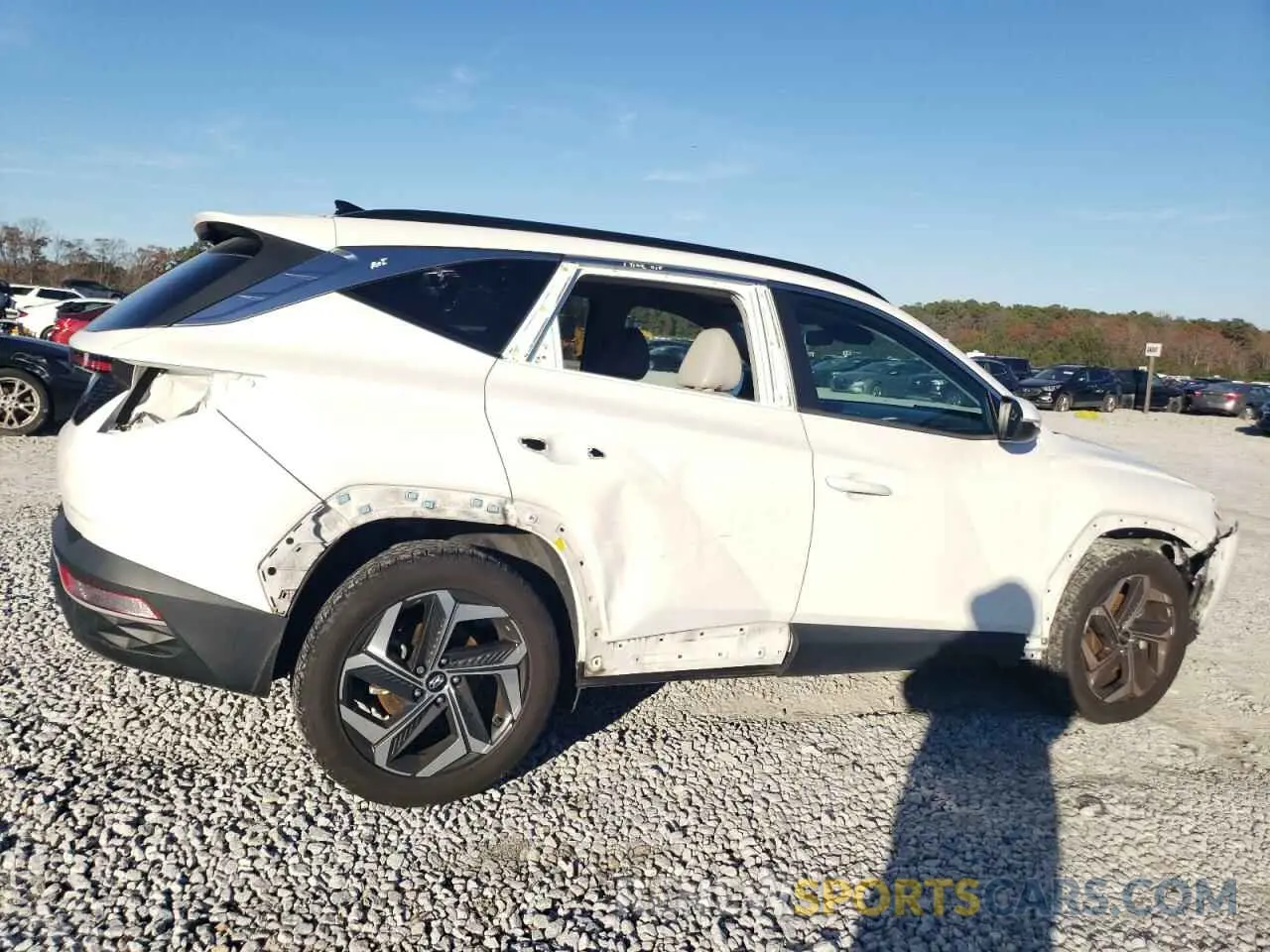 3 Photograph of a damaged car 5NMJC3AE9NH058462 HYUNDAI TUCSON 2022