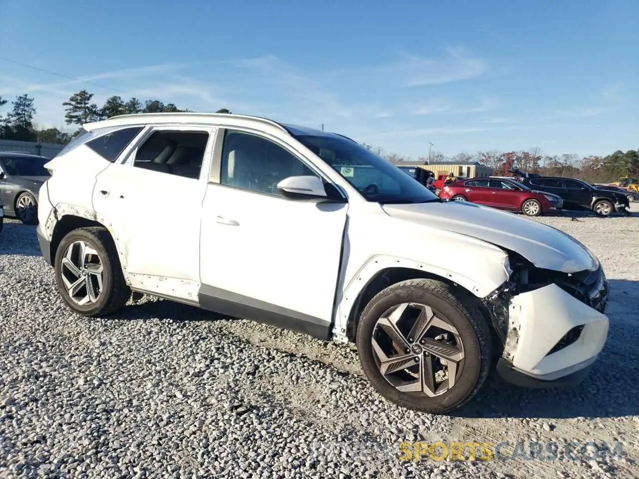 4 Photograph of a damaged car 5NMJC3AE9NH058462 HYUNDAI TUCSON 2022