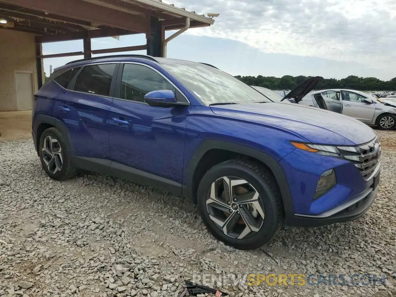 4 Photograph of a damaged car 5NMJCCAE6NH060671 HYUNDAI TUCSON 2022