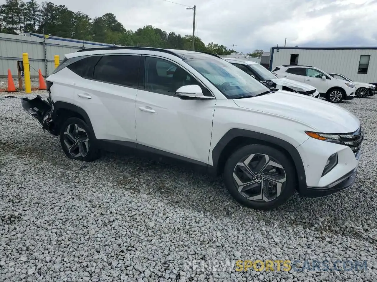 4 Photograph of a damaged car 5NMJE3AE7NH013577 HYUNDAI TUCSON 2022