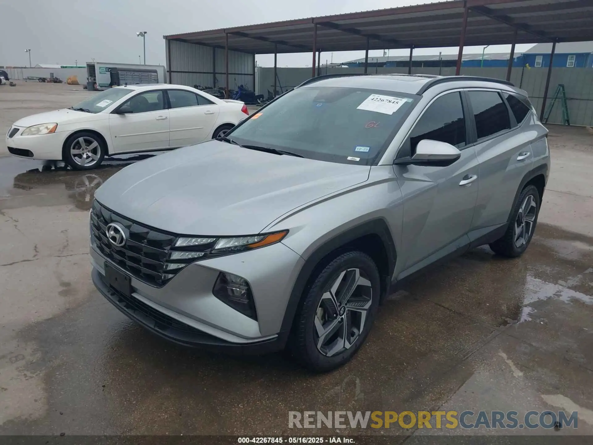 2 Photograph of a damaged car 5NMJFCAE1NH153444 HYUNDAI TUCSON 2022