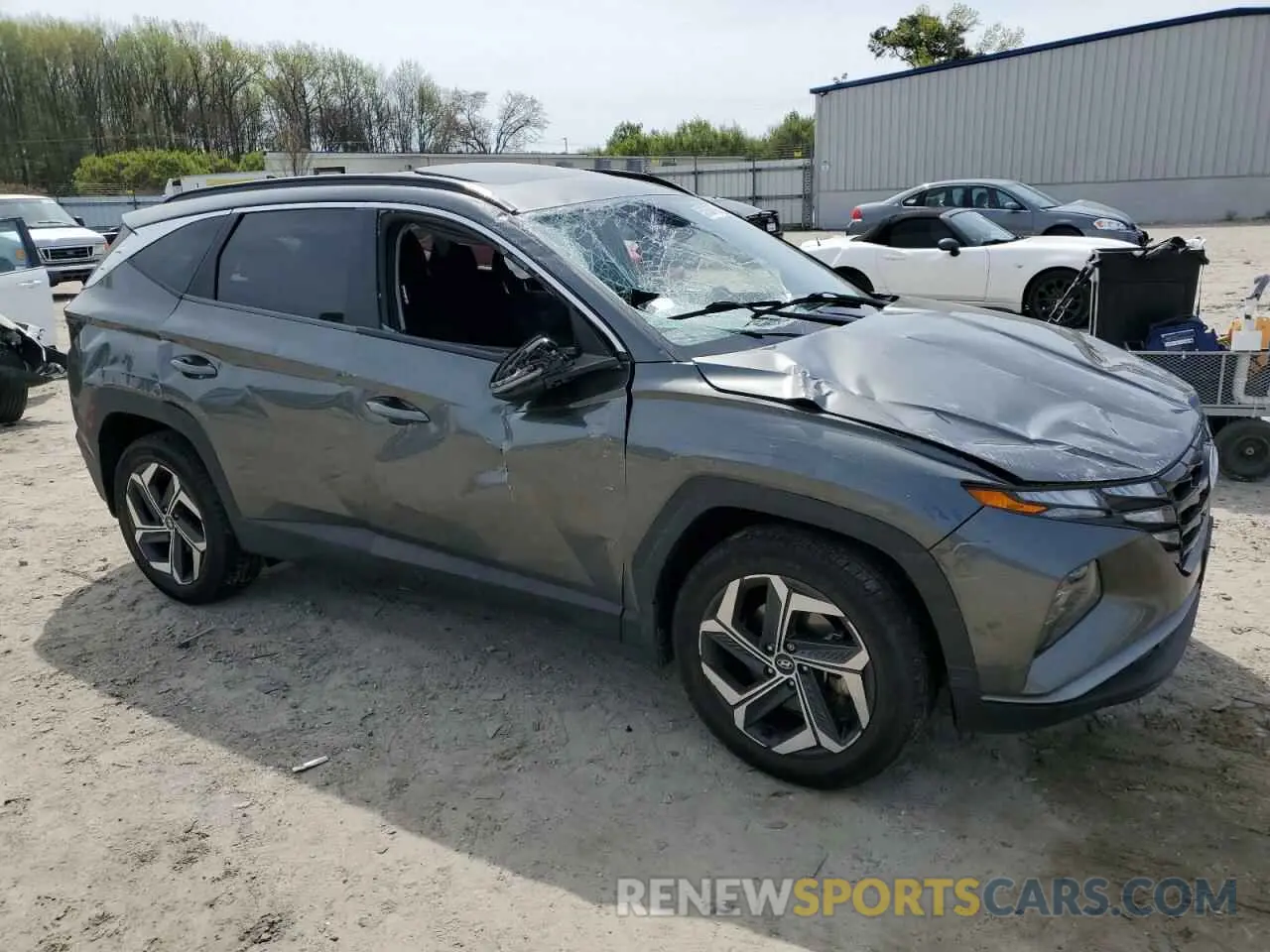 4 Фотография поврежденного автомобиля 5NMJFCAE3NH097586 HYUNDAI TUCSON 2022