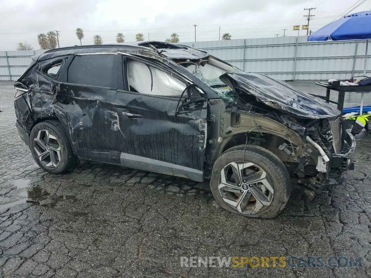 4 Фотография поврежденного автомобиля 5NMJFCAE7NH043191 HYUNDAI TUCSON 2022