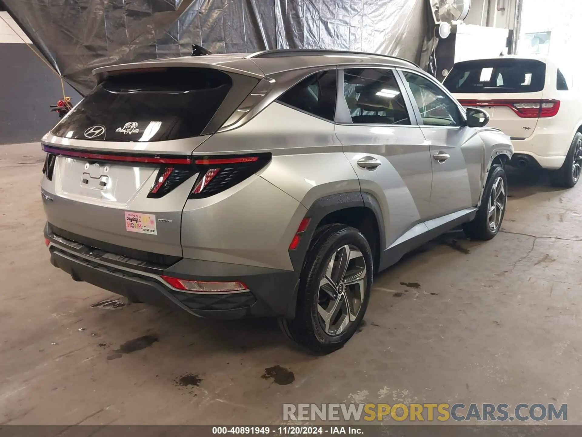 4 Photograph of a damaged car 5NMJFCAE7NH128788 HYUNDAI TUCSON 2022