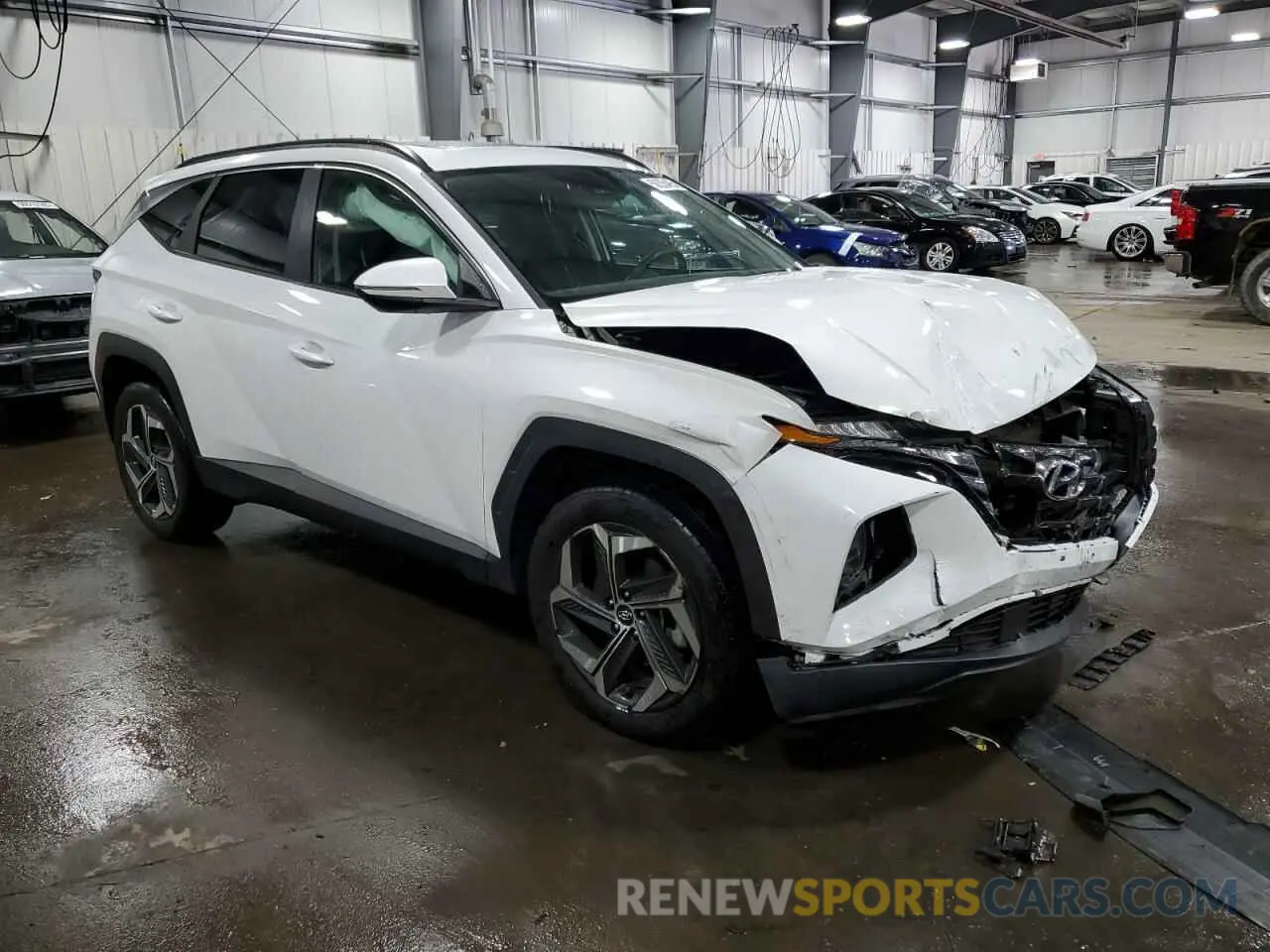 4 Photograph of a damaged car 5NMJFCAEXNH011643 HYUNDAI TUCSON 2022