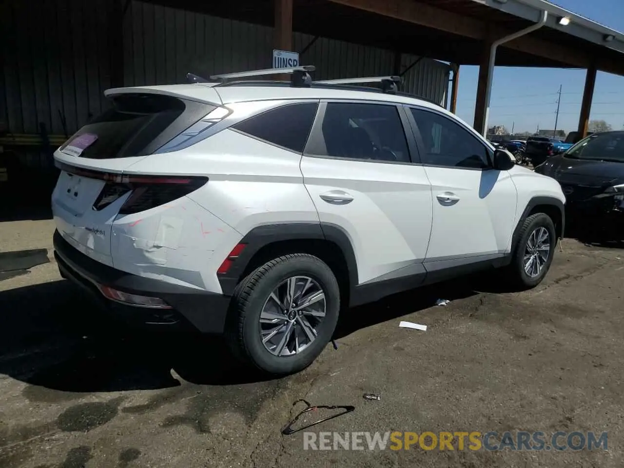 3 Фотография поврежденного автомобиля KM8JBCA19NU032500 HYUNDAI TUCSON 2022