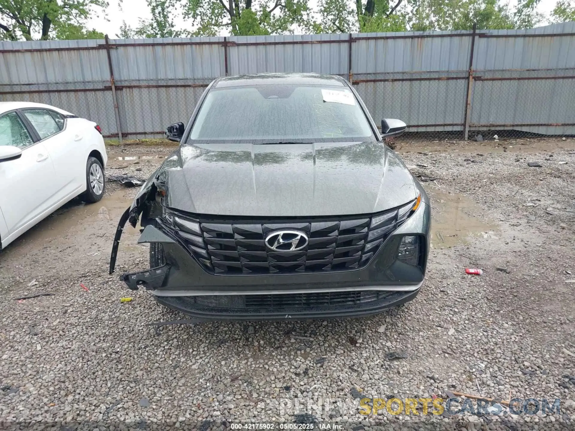 12 Фотография поврежденного автомобиля 5NMJACAE6PH176834 HYUNDAI TUCSON 2023