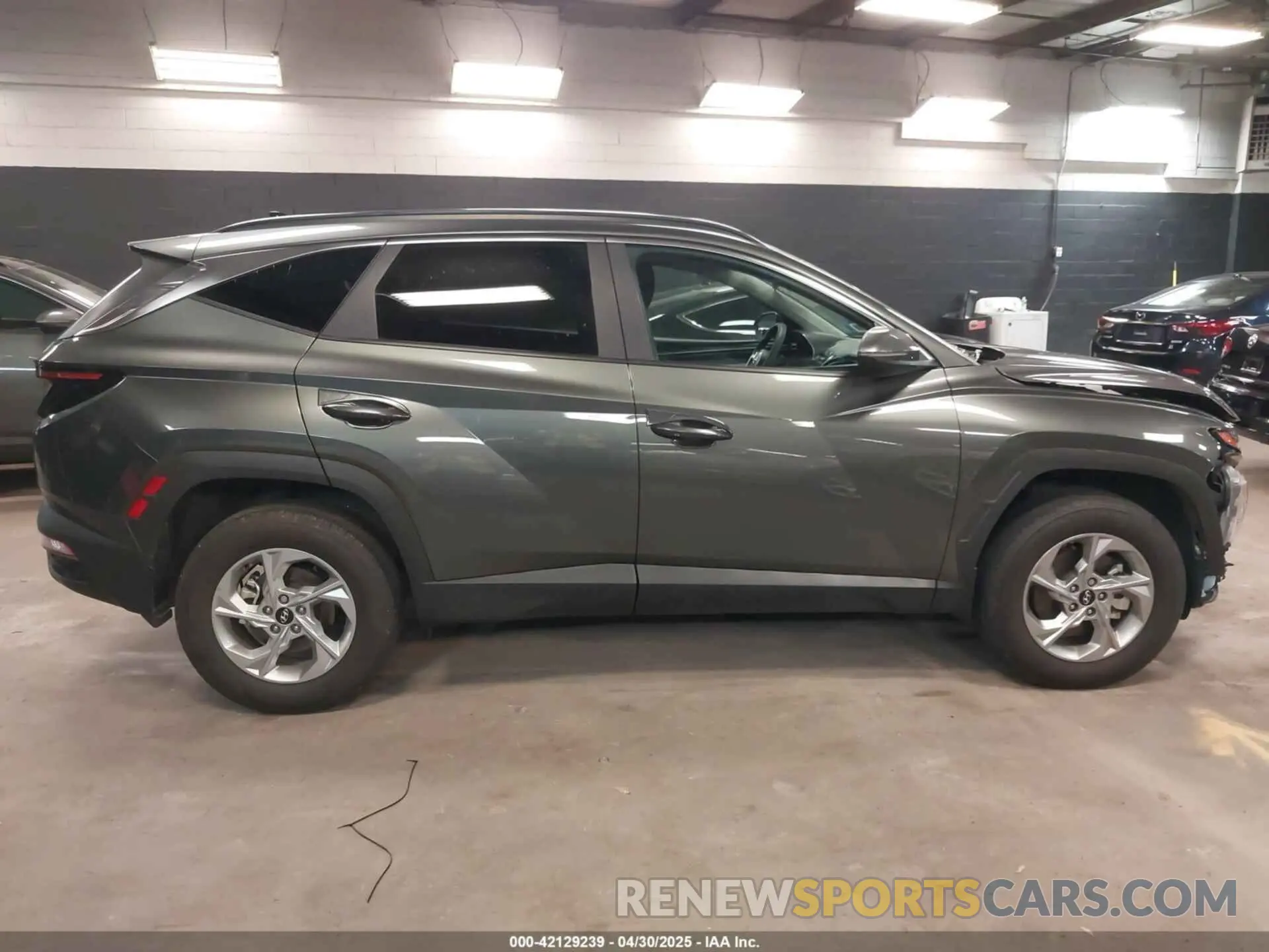 14 Photograph of a damaged car 5NMJBCAE9PH192703 HYUNDAI TUCSON 2023