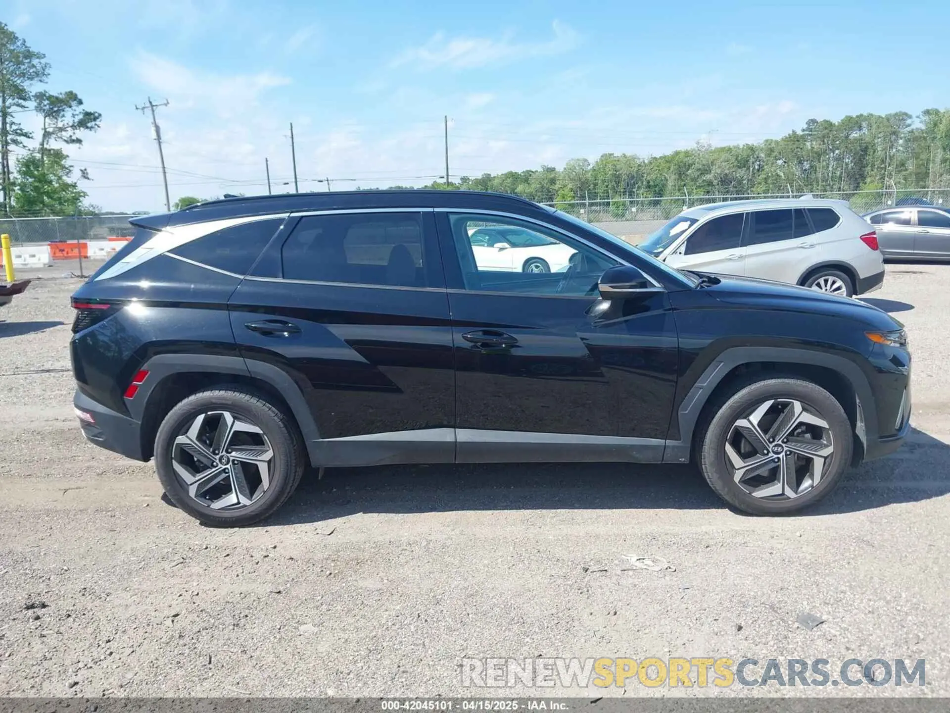 13 Фотография поврежденного автомобиля 5NMJECAE6PH190088 HYUNDAI TUCSON 2023
