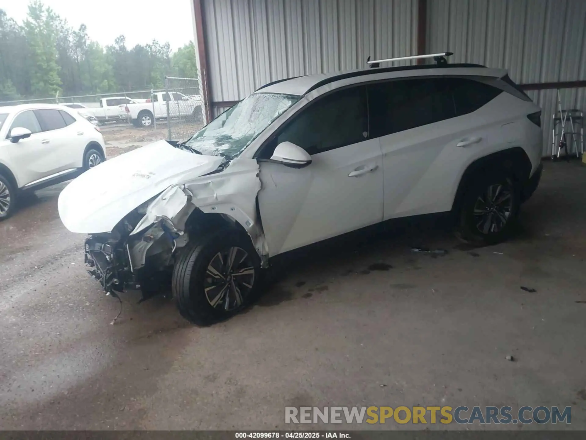 2 Photograph of a damaged car KM8JBCA19NU064198 HYUNDAI TUCSON HYBRID 2022