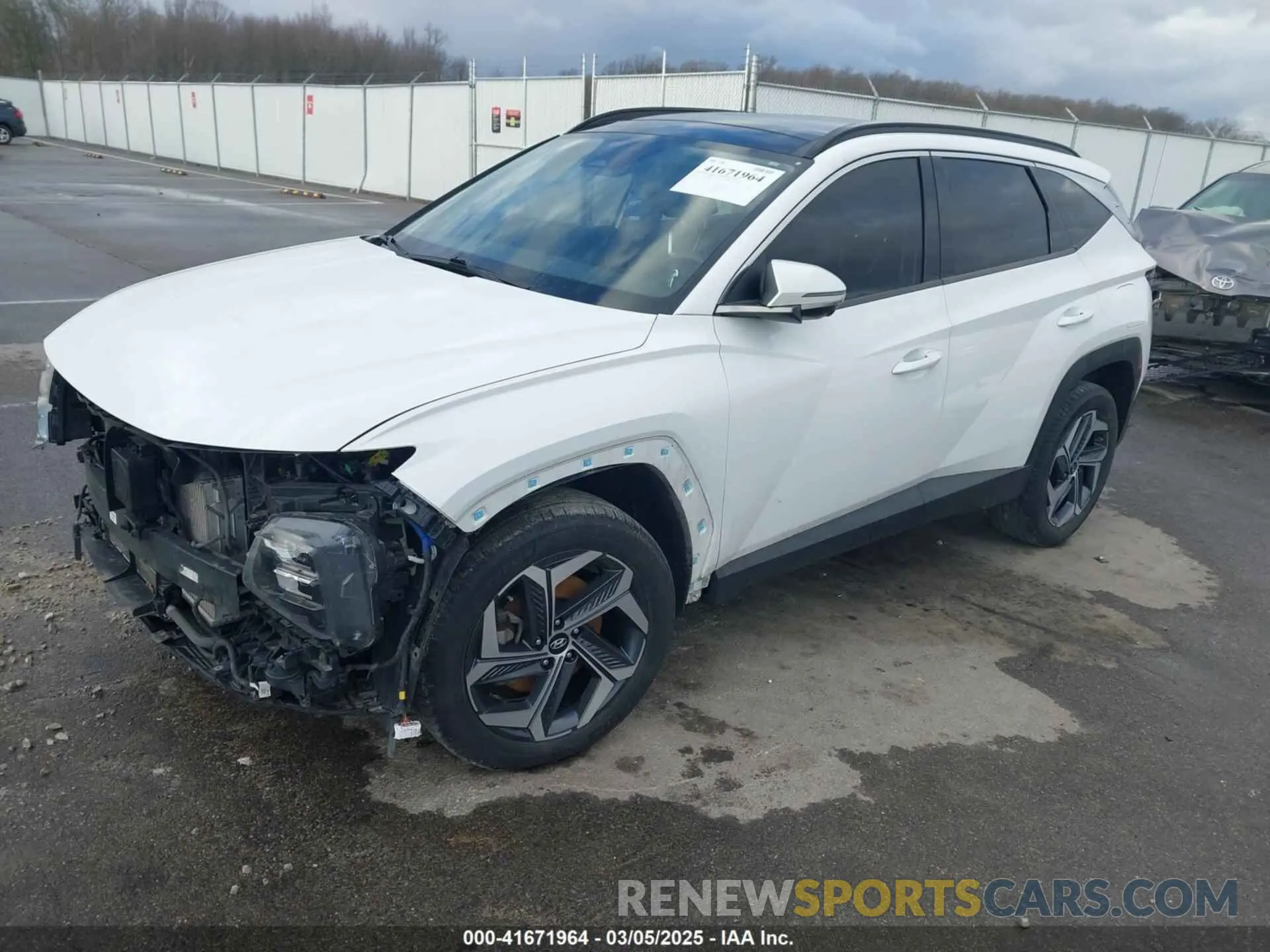 2 Photograph of a damaged car KM8JECA16NU013037 HYUNDAI TUCSON HYBRID 2022
