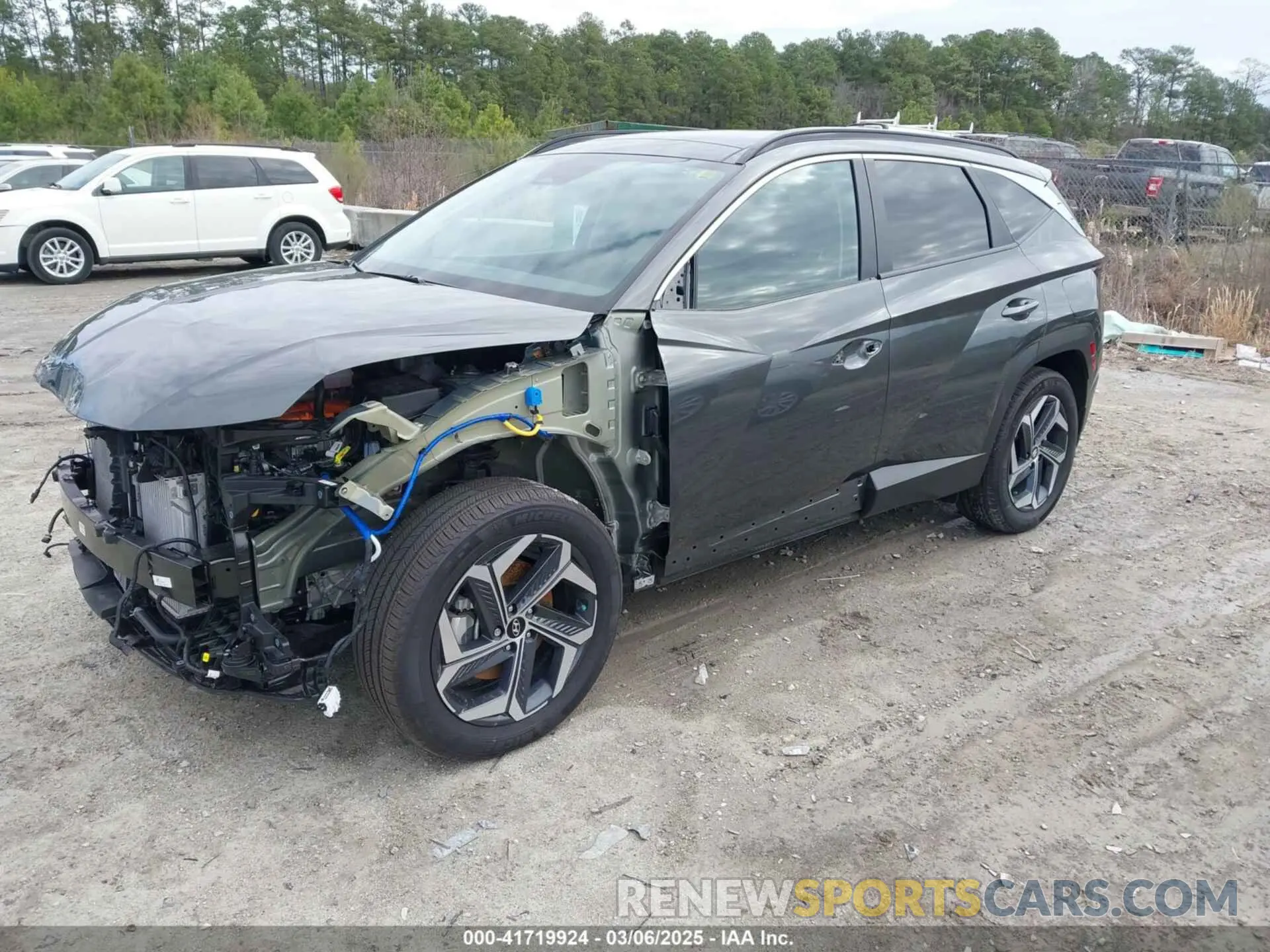 2 Фотография поврежденного автомобиля KM8JCCD12RU177361 HYUNDAI TUCSON HYBRID 2024