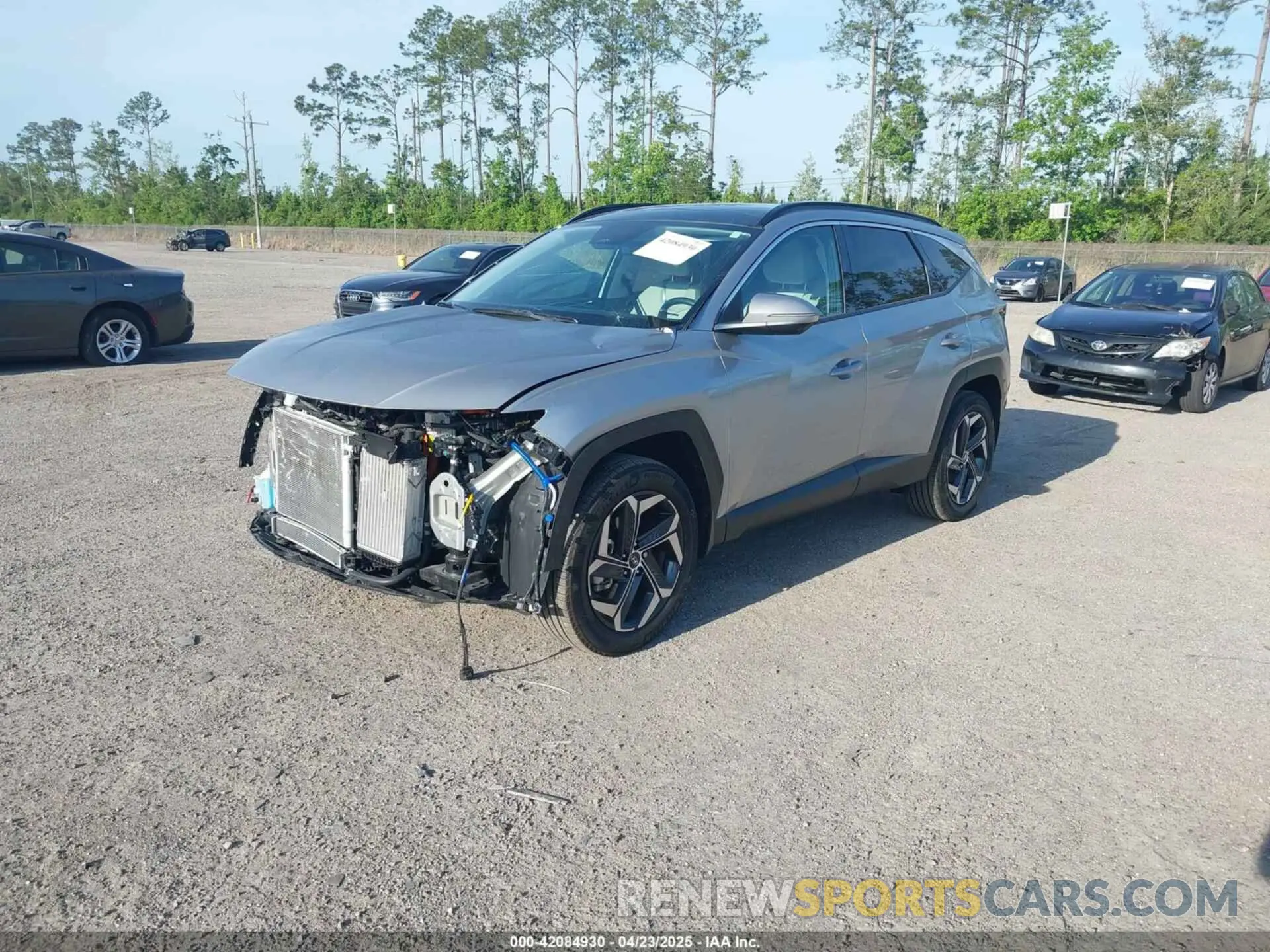 2 Фотография поврежденного автомобиля KM8JECD15RU170382 HYUNDAI TUCSON HYBRID 2024