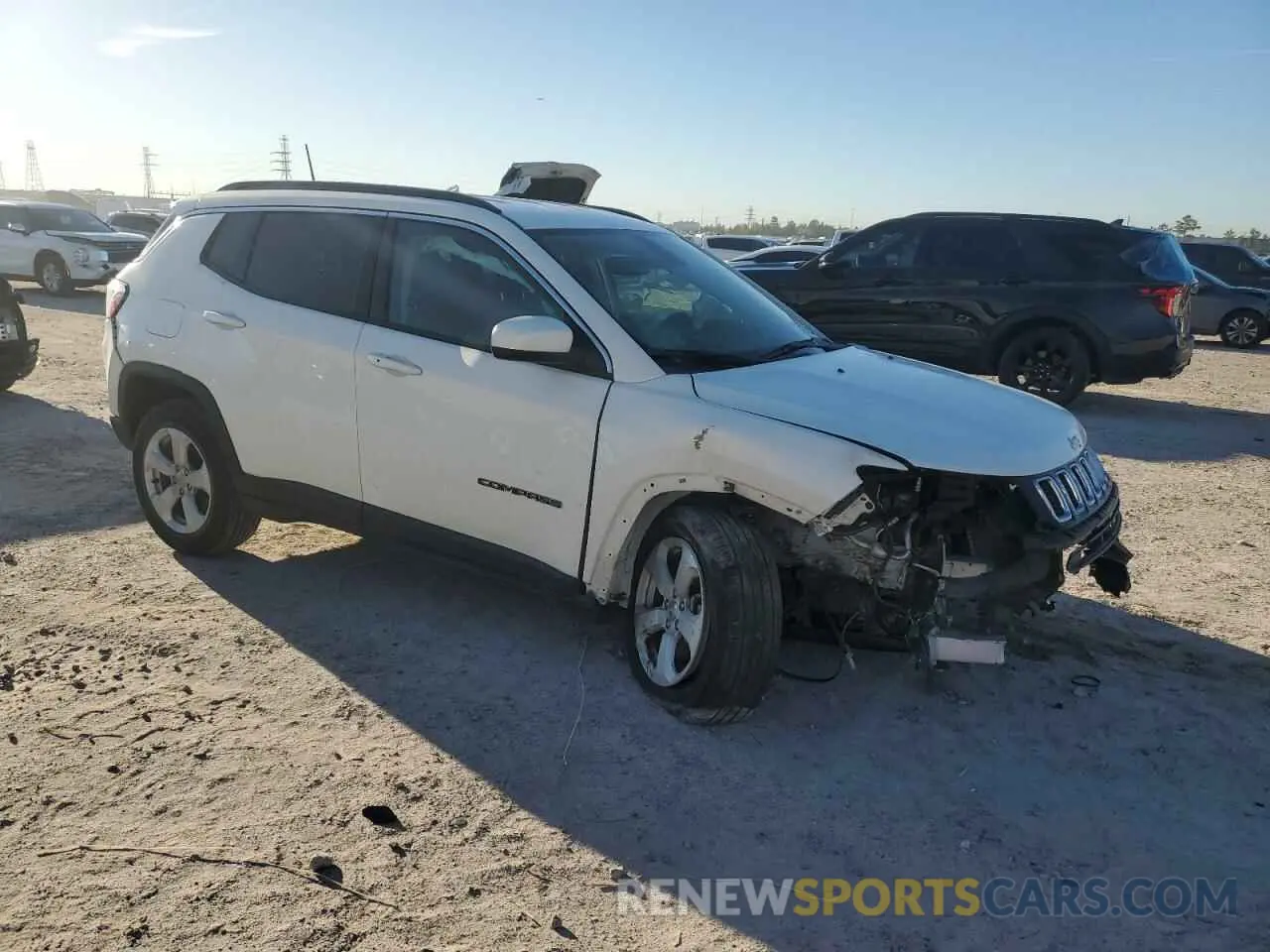 4 Photograph of a damaged car 3C4NJCBB0KT652173 JEEP COMPASS 2019