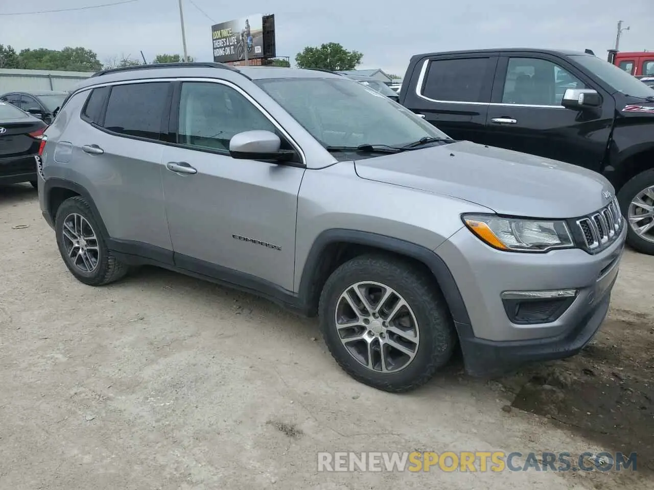 4 Photograph of a damaged car 3C4NJCBB1KT636757 JEEP COMPASS 2019