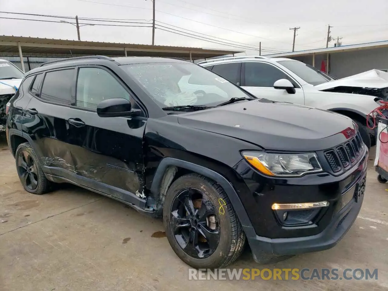 4 Photograph of a damaged car 3C4NJCBB4KT613022 JEEP COMPASS 2019