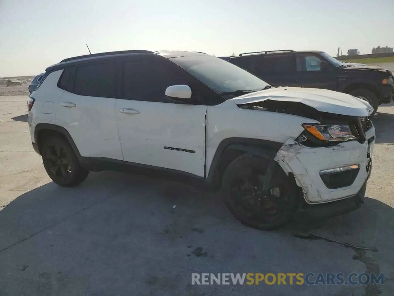 4 Photograph of a damaged car 3C4NJCBB5KT692720 JEEP COMPASS 2019