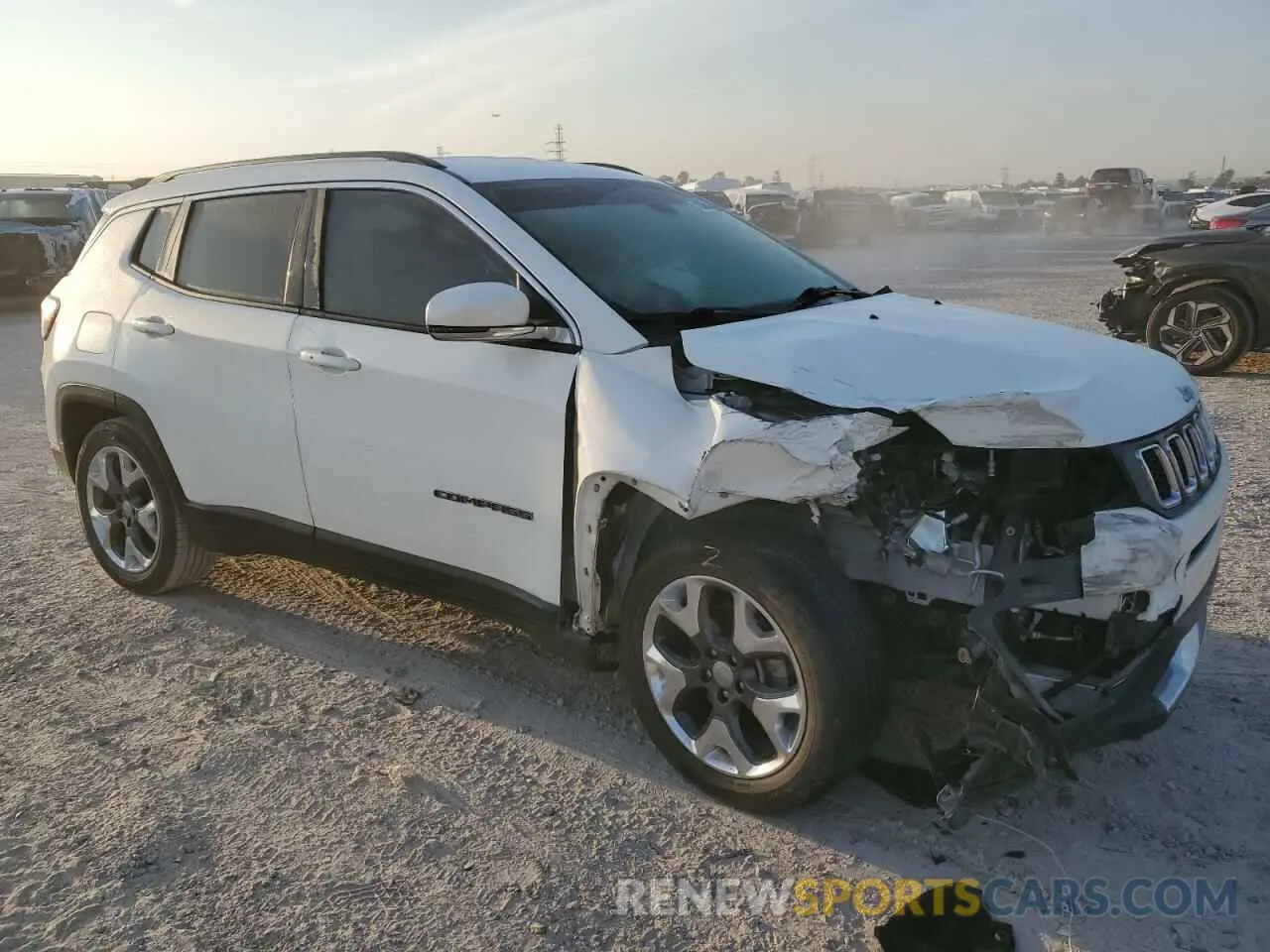 4 Photograph of a damaged car 3C4NJCCB9KT662621 JEEP COMPASS 2019