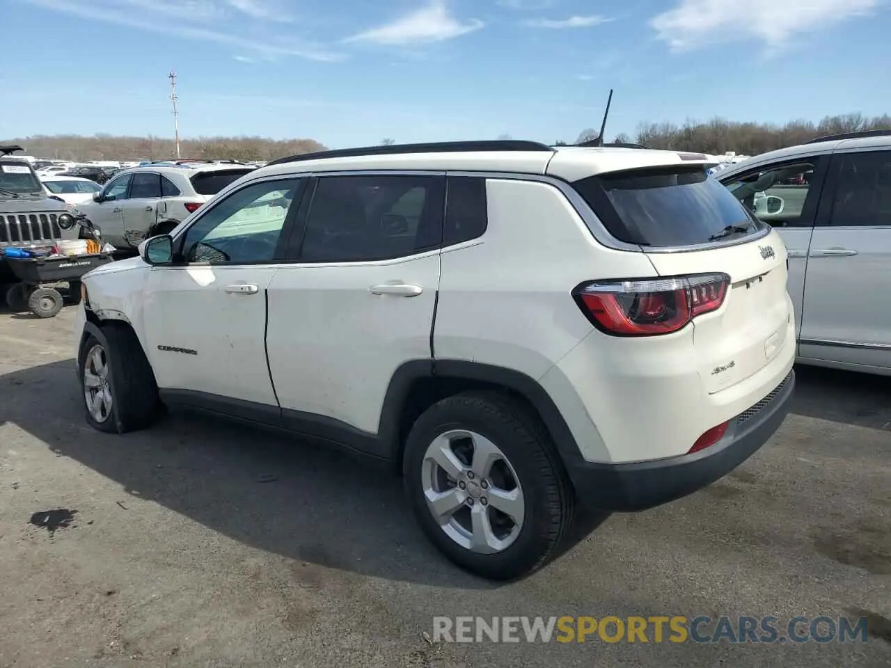 2 Photograph of a damaged car 3C4NJDBB1KT850900 JEEP COMPASS 2019
