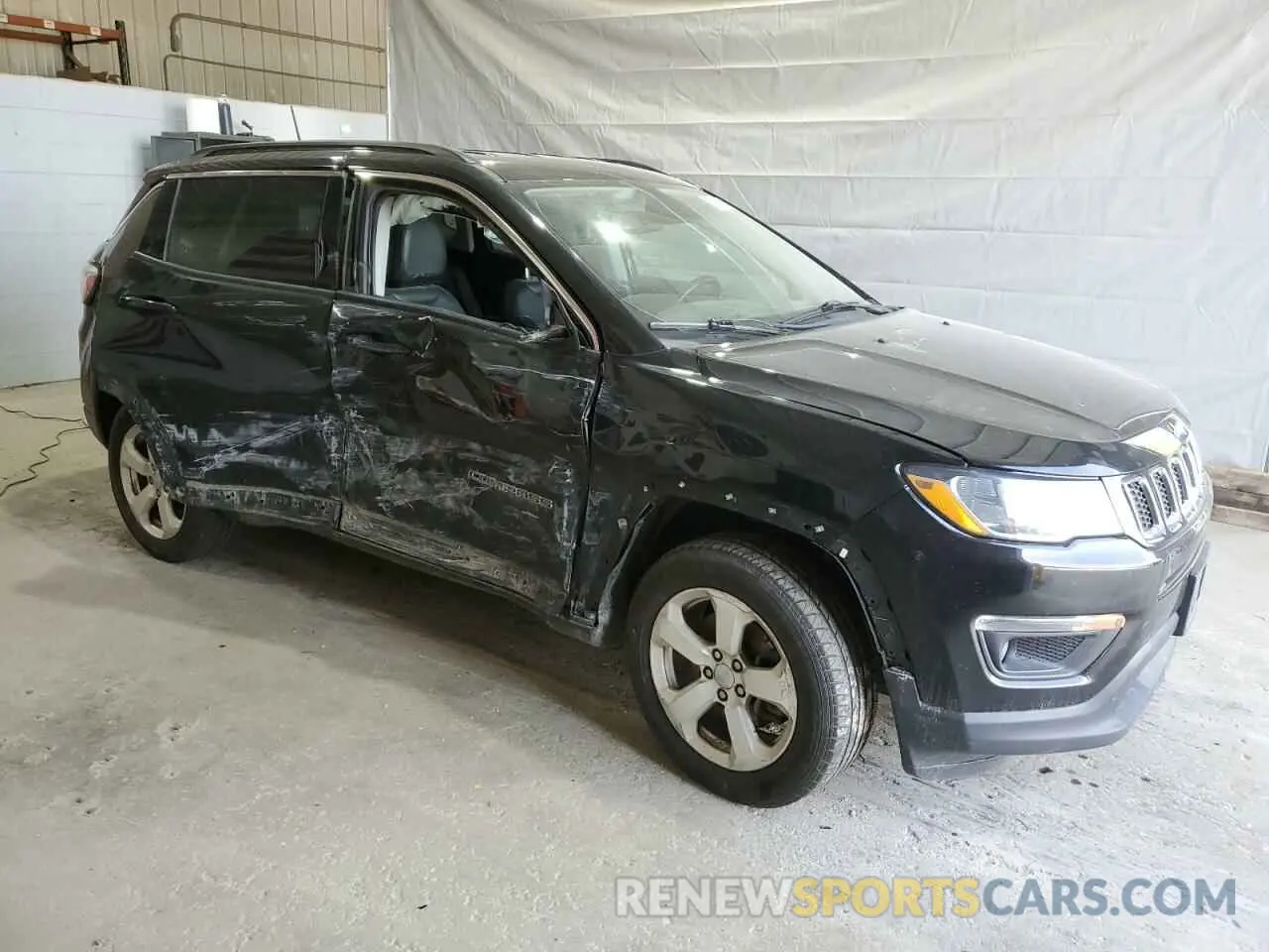 4 Photograph of a damaged car 3C4NJDBB2KT786690 JEEP COMPASS 2019