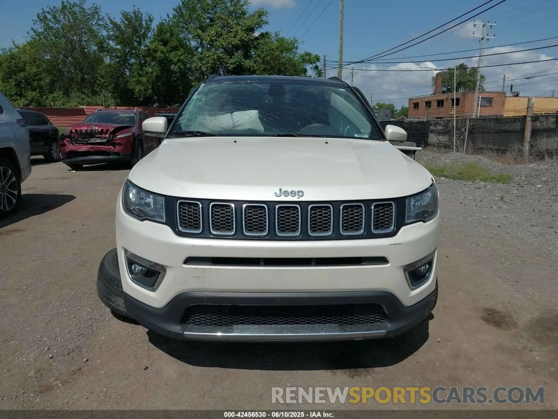 12 Photograph of a damaged car 3C4NJDCB4KT818425 JEEP COMPASS 2019