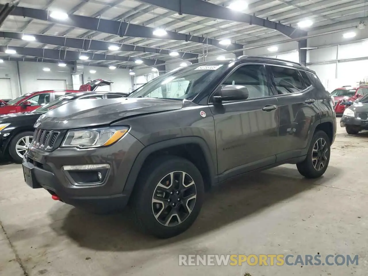 1 Photograph of a damaged car 3C4NJDDB2KT752469 JEEP COMPASS 2019