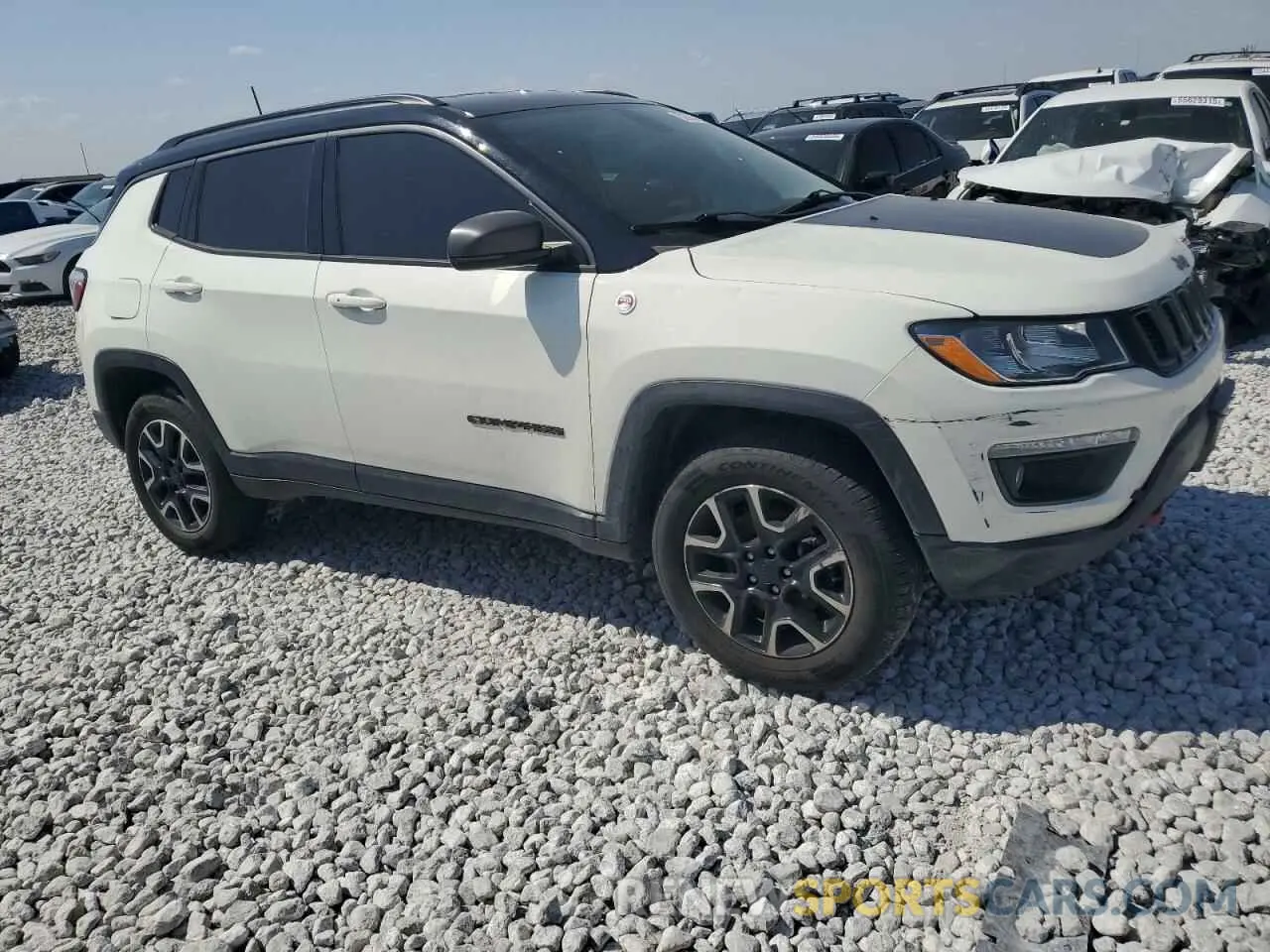 4 Photograph of a damaged car 3C4NJDDB8KT791261 JEEP COMPASS 2019