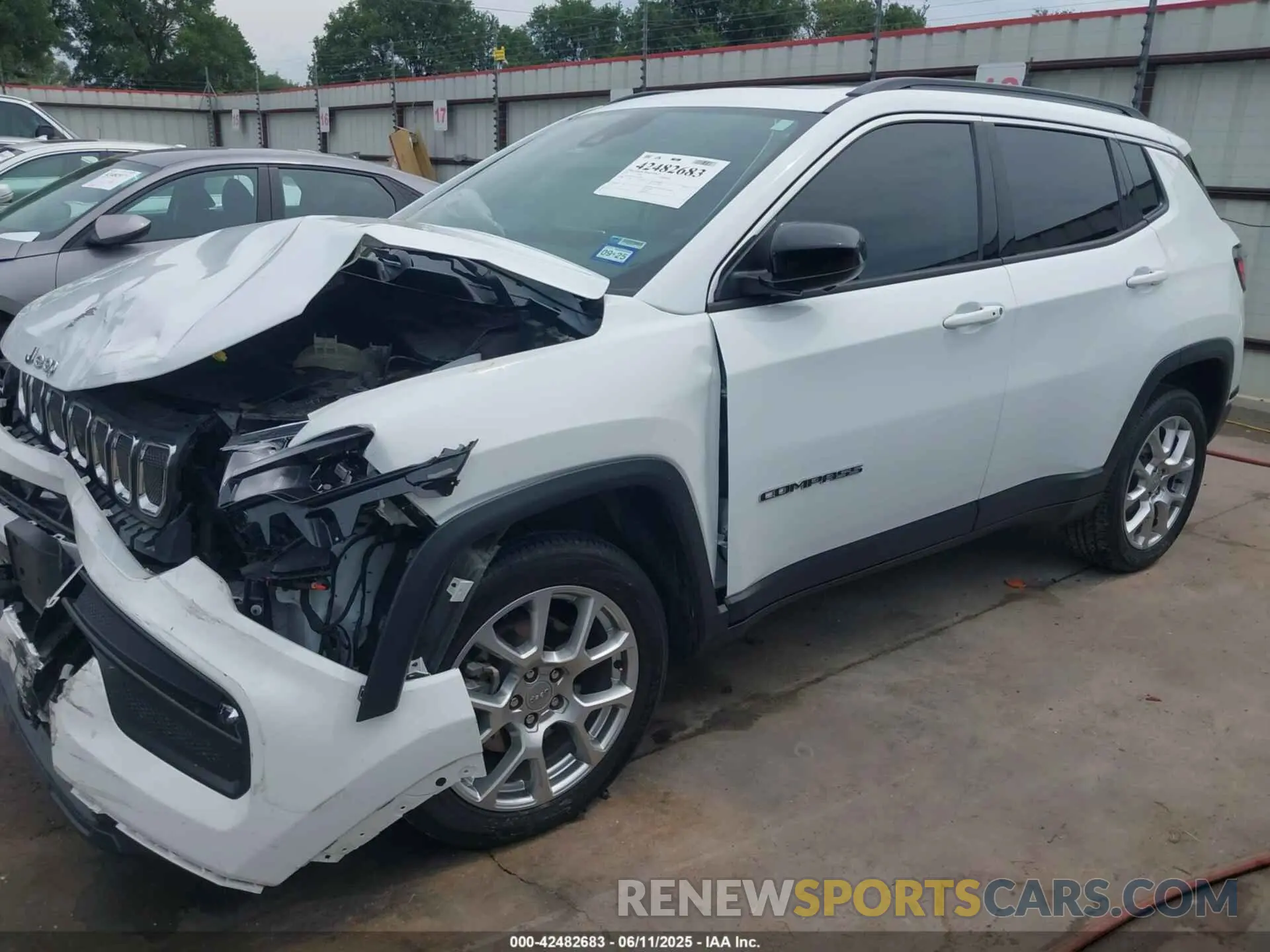 14 Photograph of a damaged car 3C4NJDFB4NT211280 JEEP COMPASS 2022