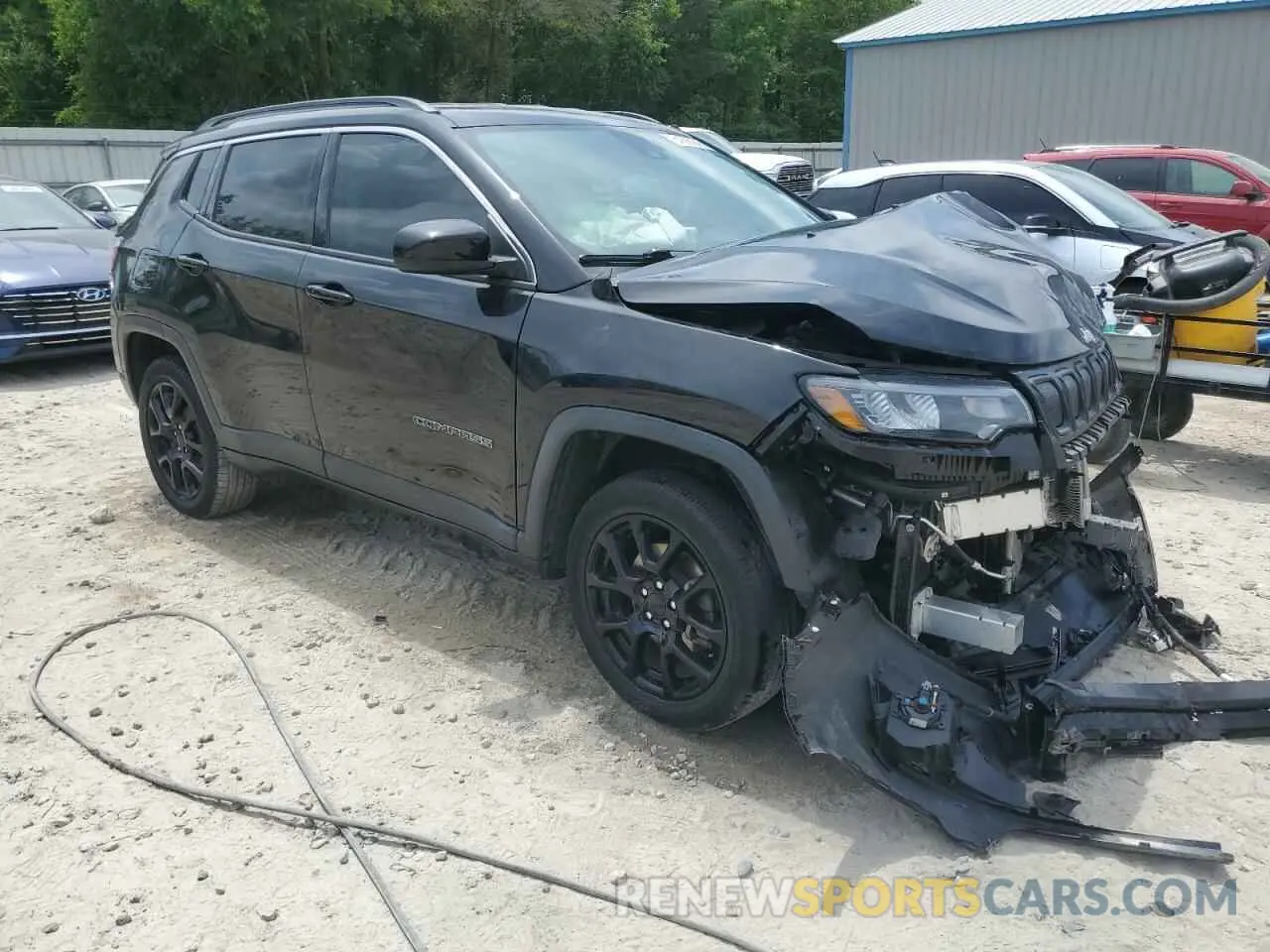 4 Photograph of a damaged car 3C4NJDFB5NT131065 JEEP COMPASS 2022