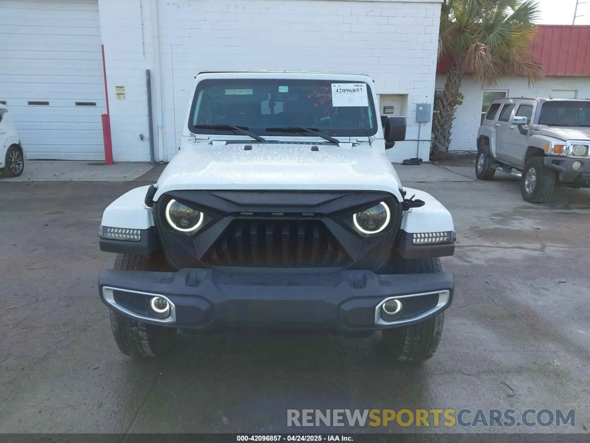12 Photograph of a damaged car 1C6HJTAG2PL504790 JEEP GLADIATOR 2023