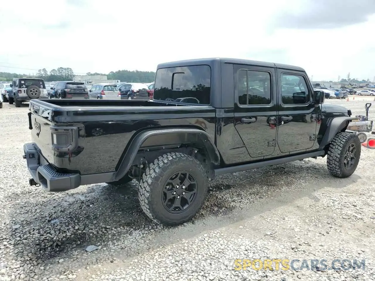 3 Фотография поврежденного автомобиля 1C6HJTAG9PL525183 JEEP GLADIATOR 2023