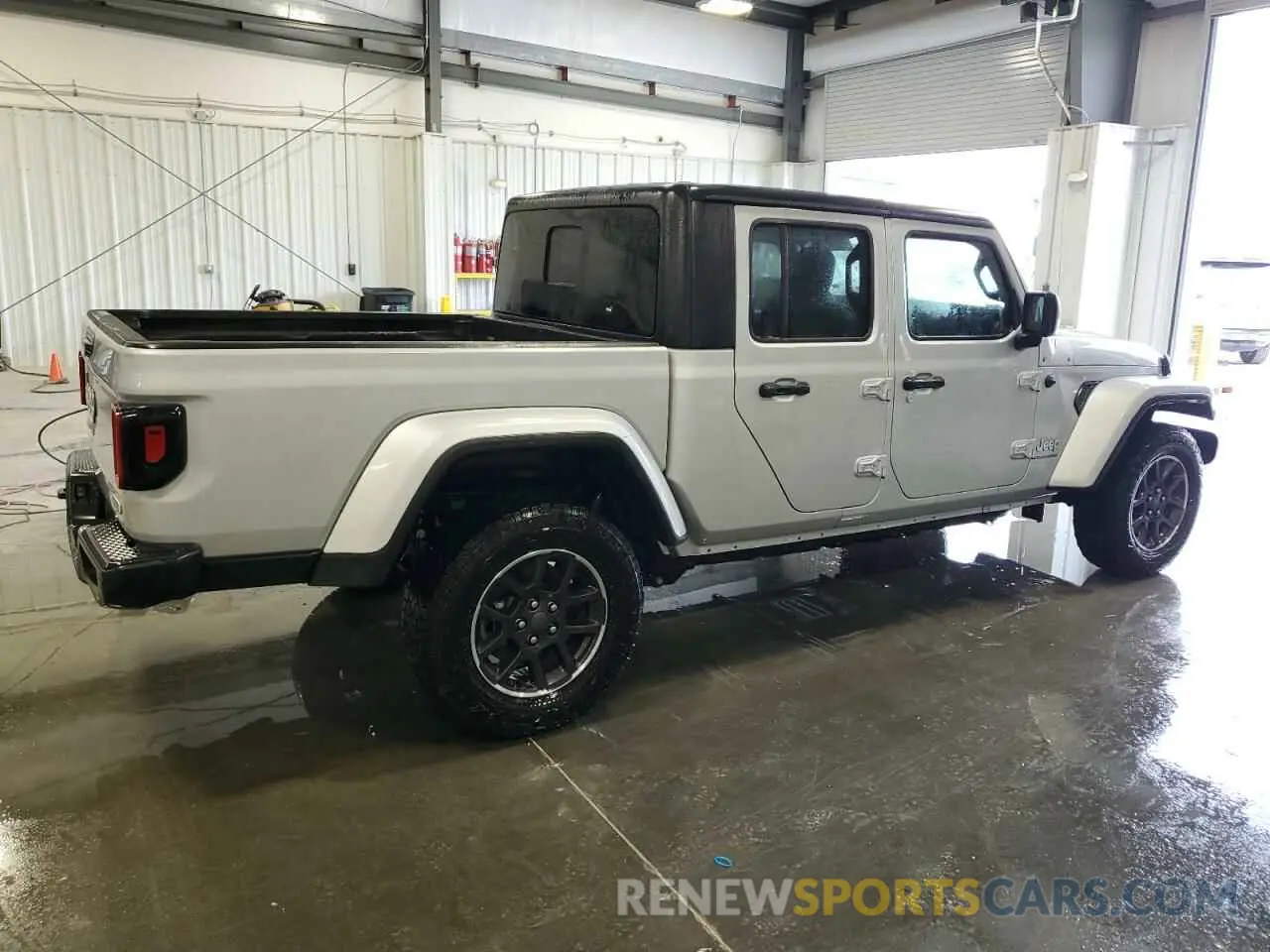 3 Photograph of a damaged car 1C6HJTFG9PL559892 JEEP GLADIATOR 2023